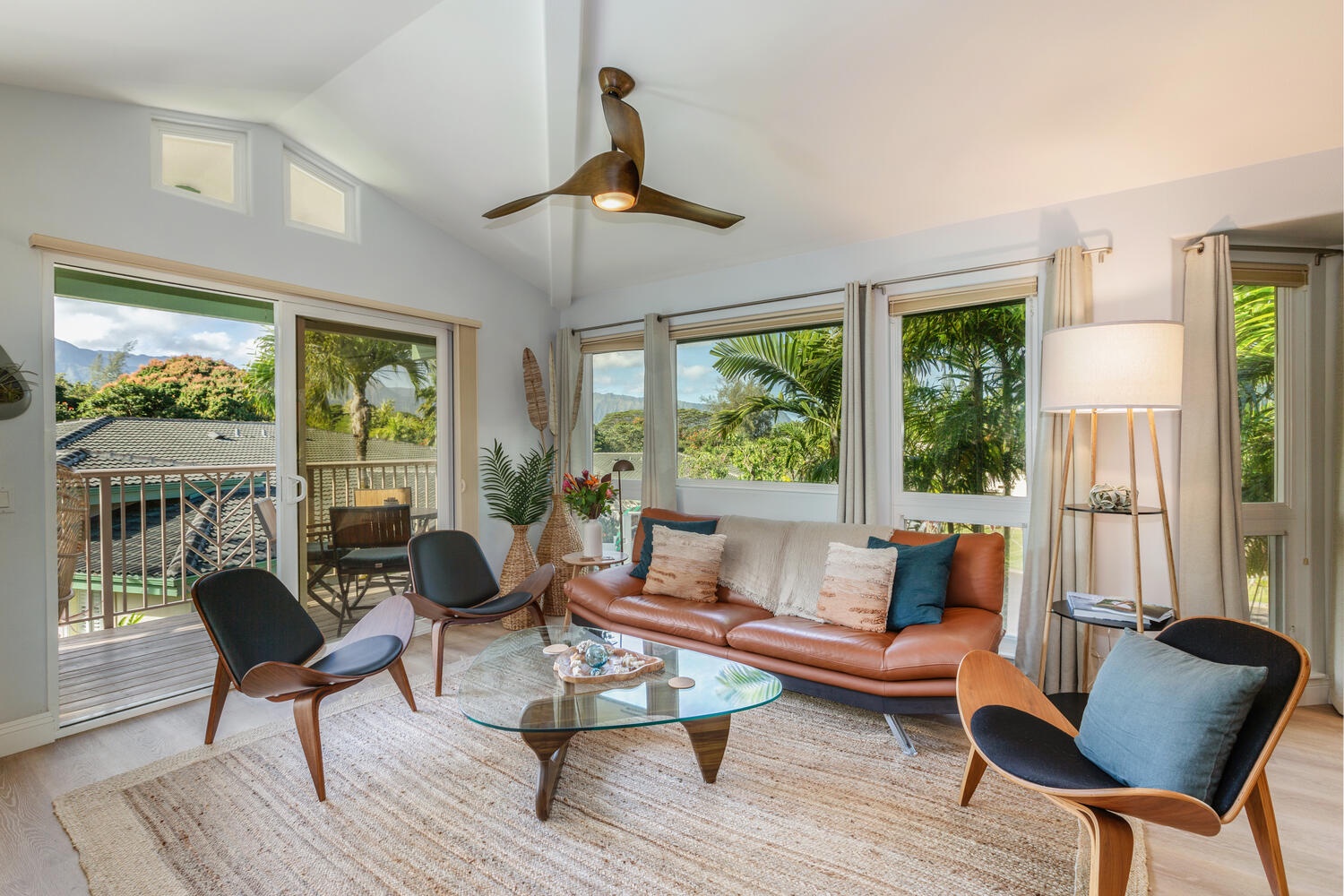 Princeville Vacation Rentals, Sea Glass - Cozy living area with plenty of seats and direct access to the lanai.