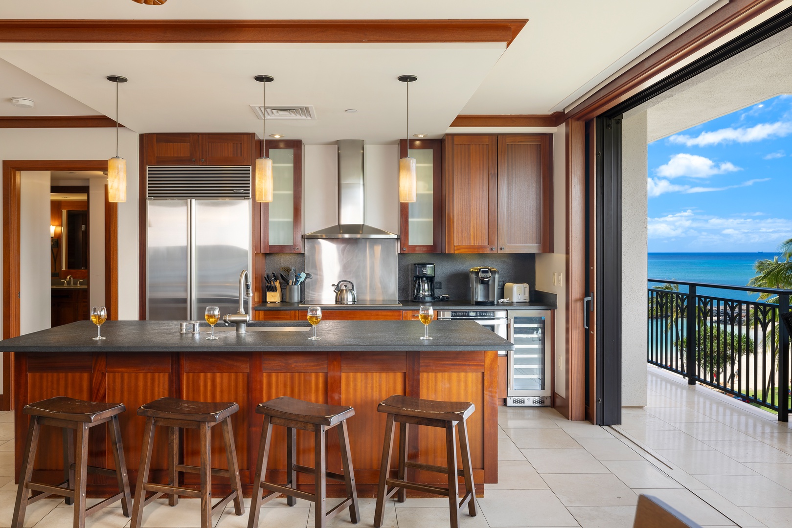Kapolei Vacation Rentals, Ko Olina Beach Villas B506 - Cook with paradise just steps away in this stunning kitchen, where ocean views and modern appliances create your perfect tropical retreat.