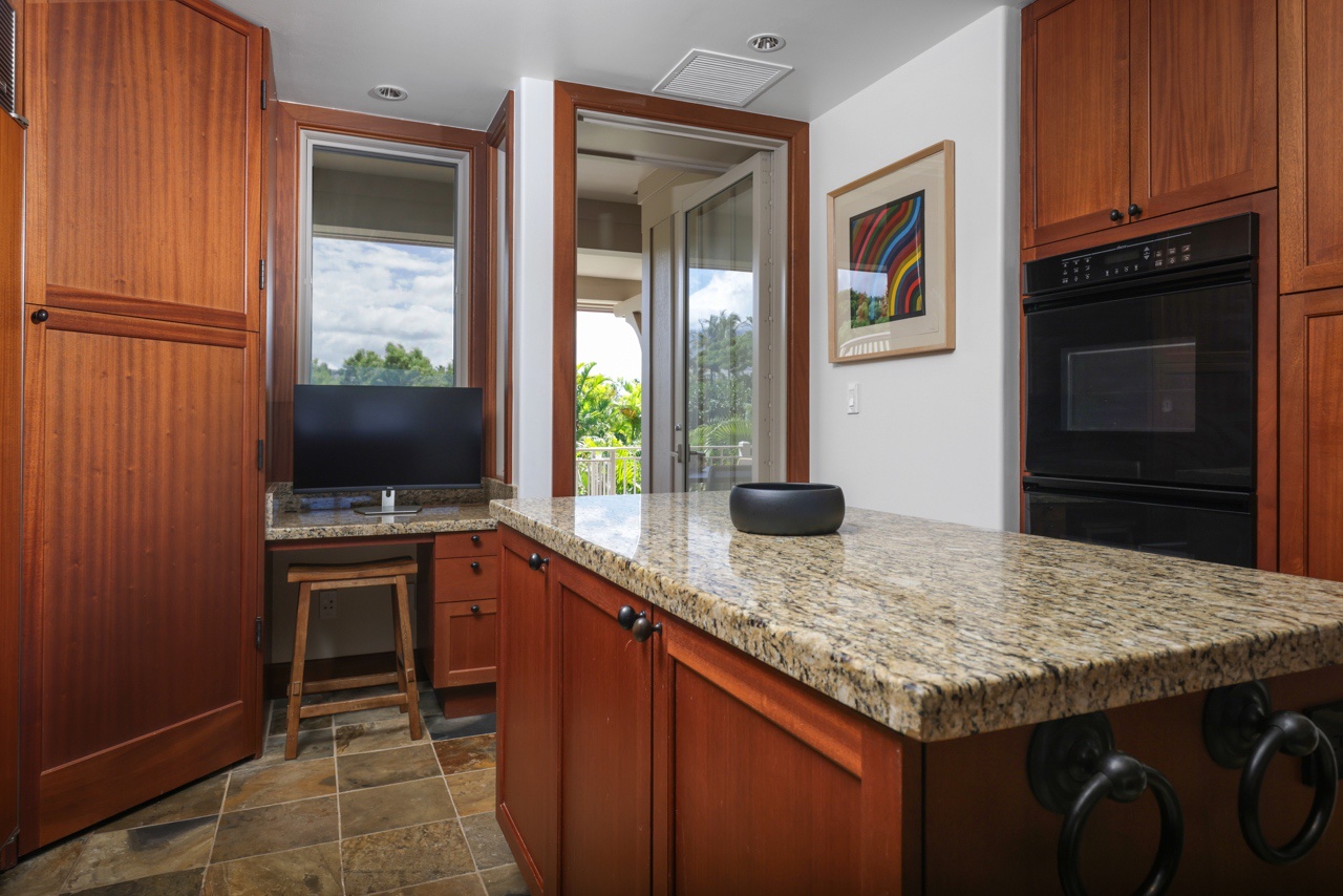 Kailua Kona Vacation Rentals, 3BD Ka'Ulu Villa (109A) at Hualalai Resort - View of the kitchen showcasing the center island and circular, open flow.