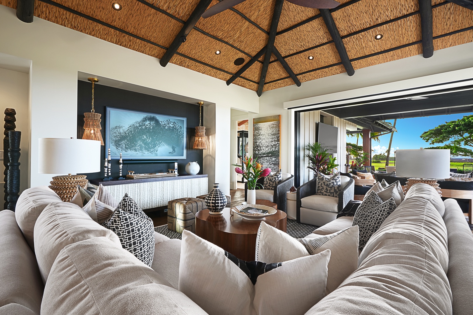 Koloa Vacation Rentals, Hale Pakika at Kukui'ula - The living area with vaulted ceilings features comfortable seating for all, flat screen tv is perfect for visiting or quiet time.