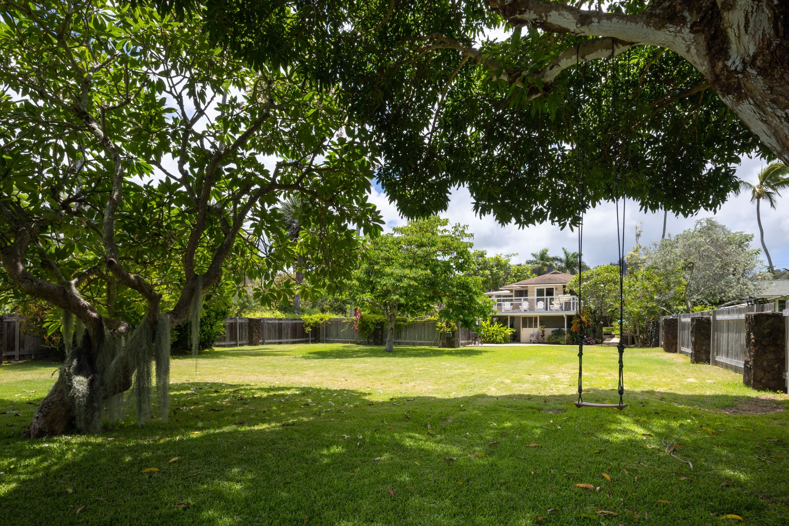 Kahuku Vacation Rentals, Hale Pellicano - The expansive backyard is perfect for outdoor activities.