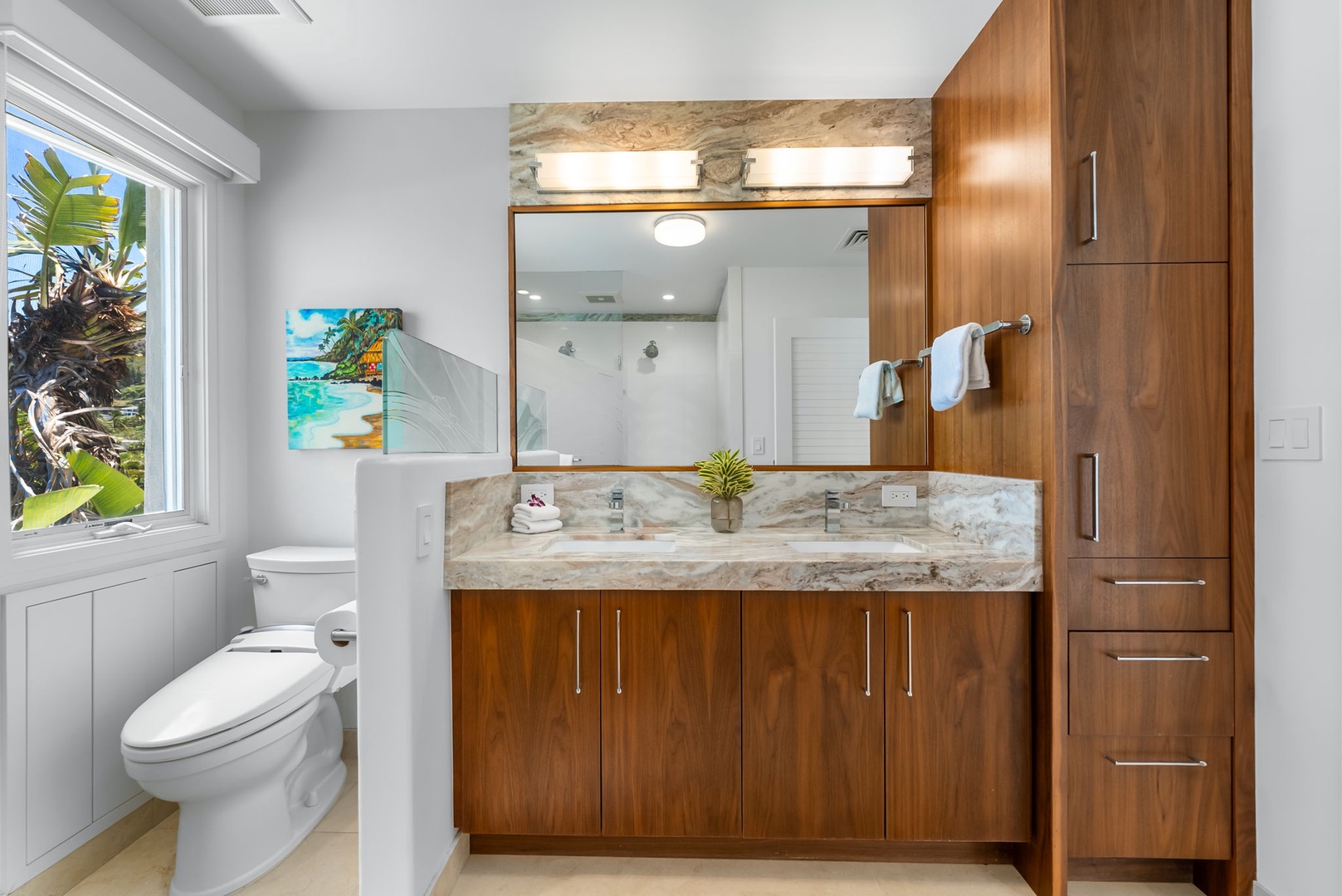 Kailua Vacation Rentals, Lanikai Sunrise Estate - Dual vanity and ocean-inspired finishes make this ensuite as elegant as it is functional.
