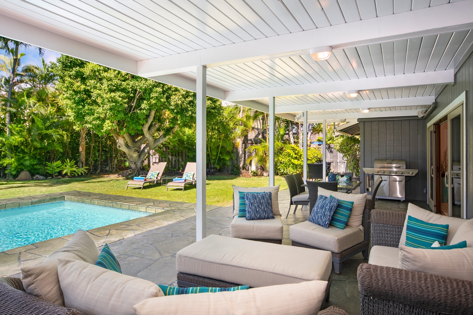 Honolulu Vacation Rentals, Hale Niuiki - Take a dip or lounge poolside with a drink in hand, surrounded by the lush landscape of this island paradise
