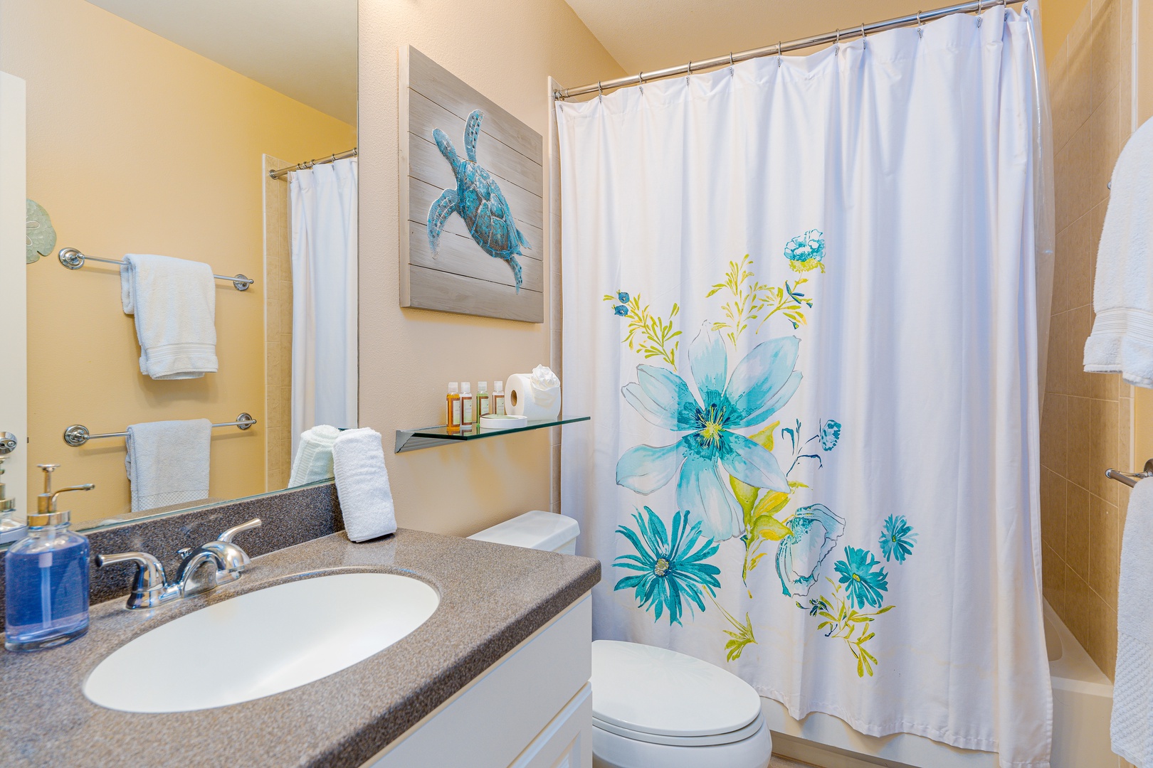 Kapolei Vacation Rentals, Ko Olina Kai 1081C - The guest bathroom with a shower.