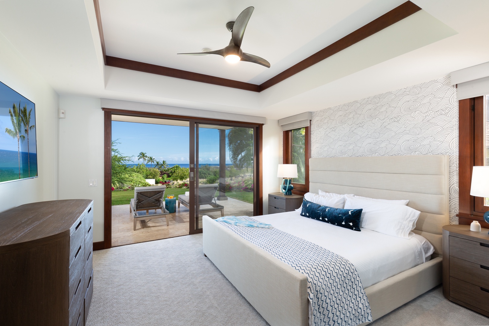 Kailua-Kona Vacation Rentals, 3BD Hali'ipua Villa (120) at Four Seasons Resort at Hualalai - Second bedroom with king size bed, 55‘’ flat screen TV, en suite bath and sliding doors to a private furnished lanai
