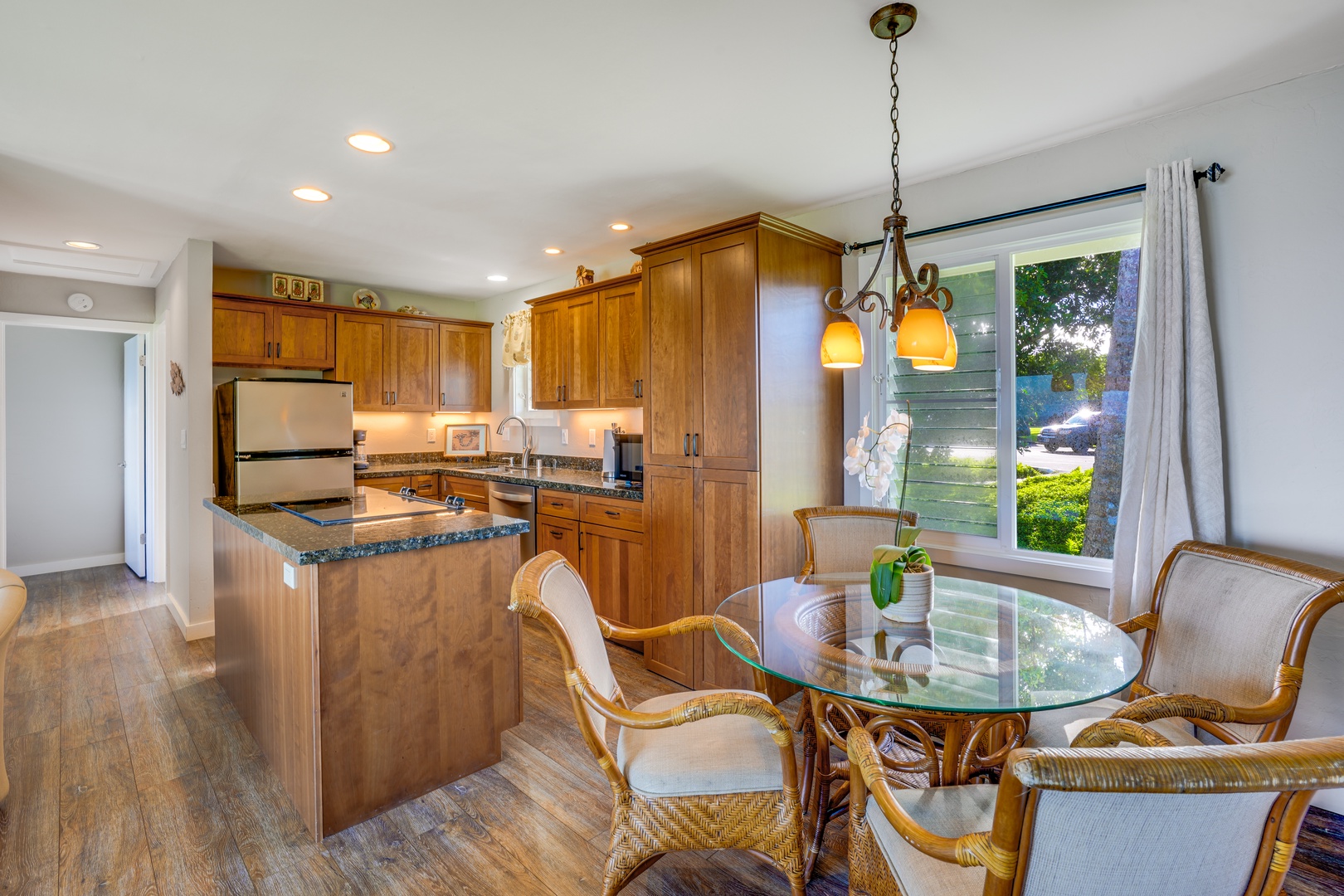 Princeville Vacation Rentals, Alii Kai 7201 - The dining space, with its charming setting for four.