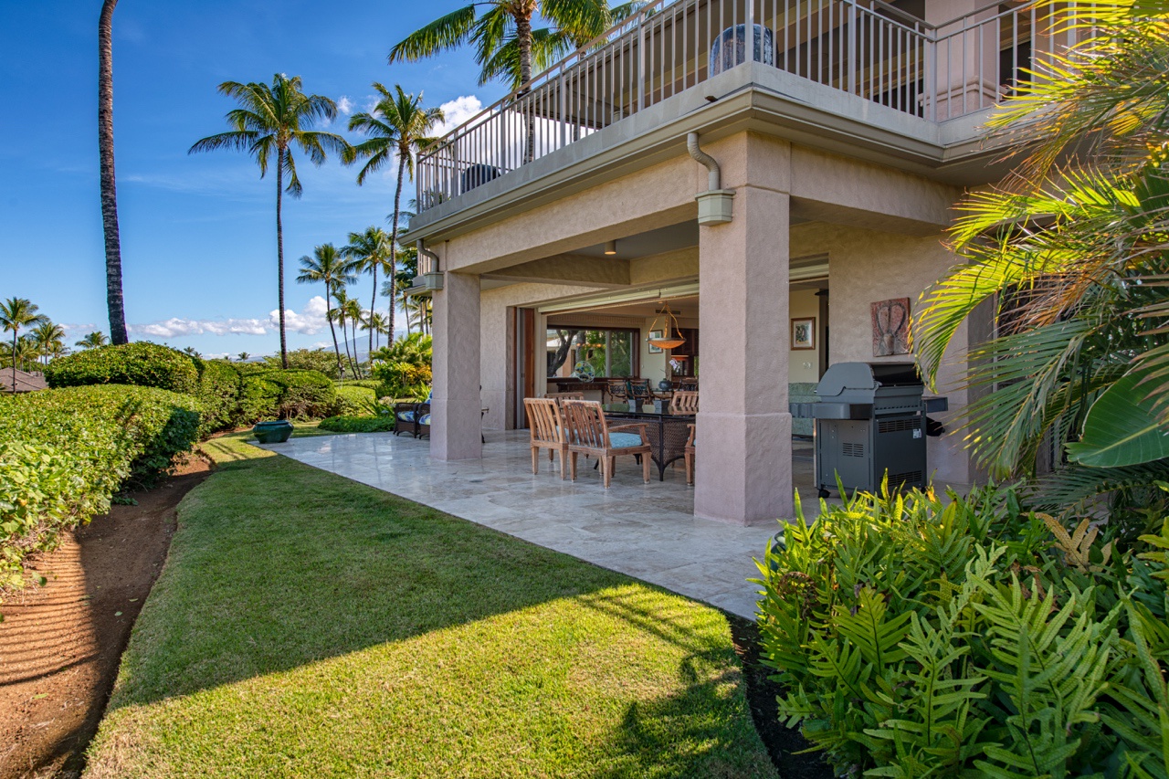 Kailua Kona Vacation Rentals, 2BD Hillside Villa (4102) at Hualalai Resort - Enjoy the lanai with a BBQ grill and lush garden views, perfect for outdoor dining and relaxation.