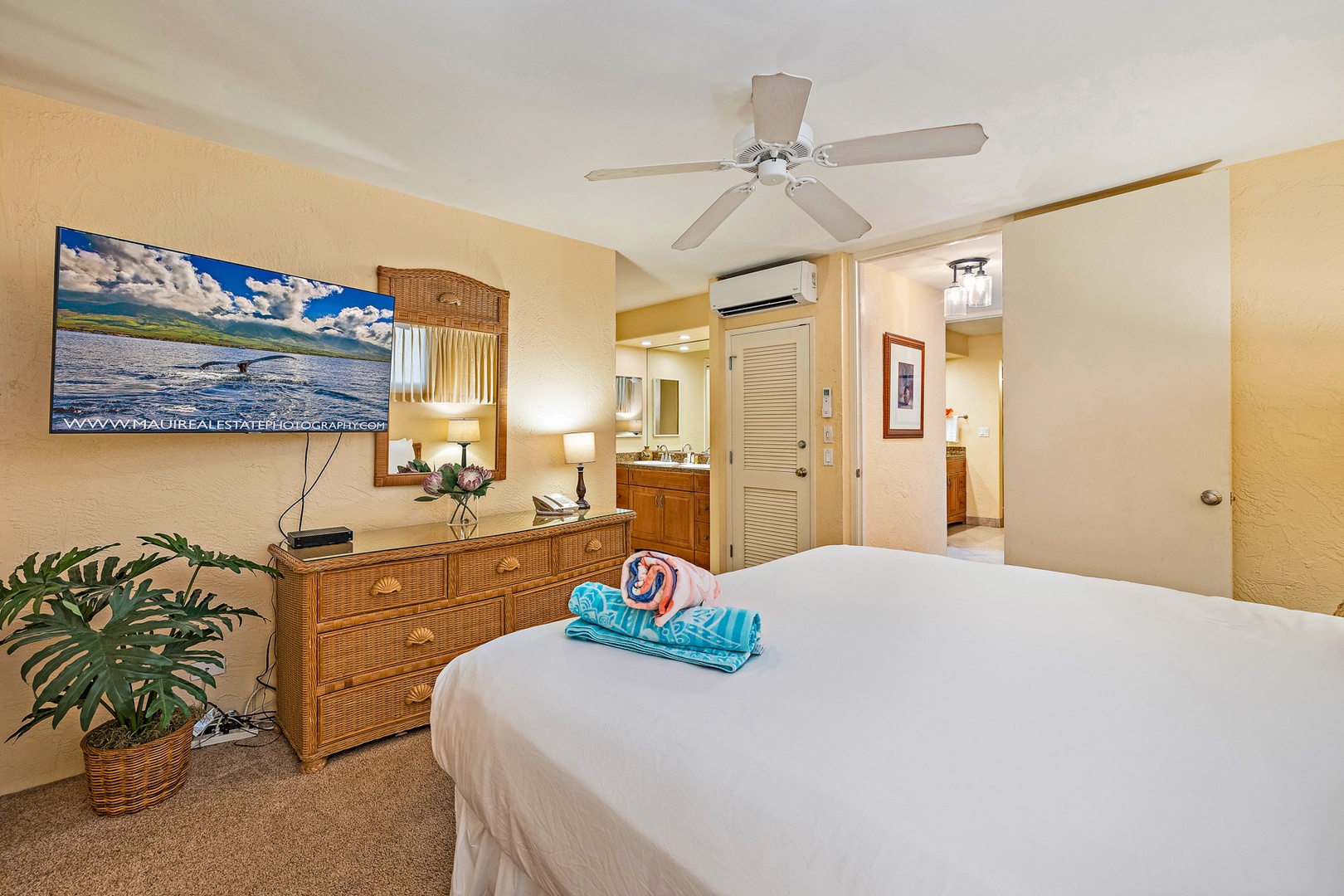 Lahaina Vacation Rentals, Papakea G-306 - The bedroom offers plenty of storage with a dresser and closet, along with a TV for relaxing nights in after a day of adventure.