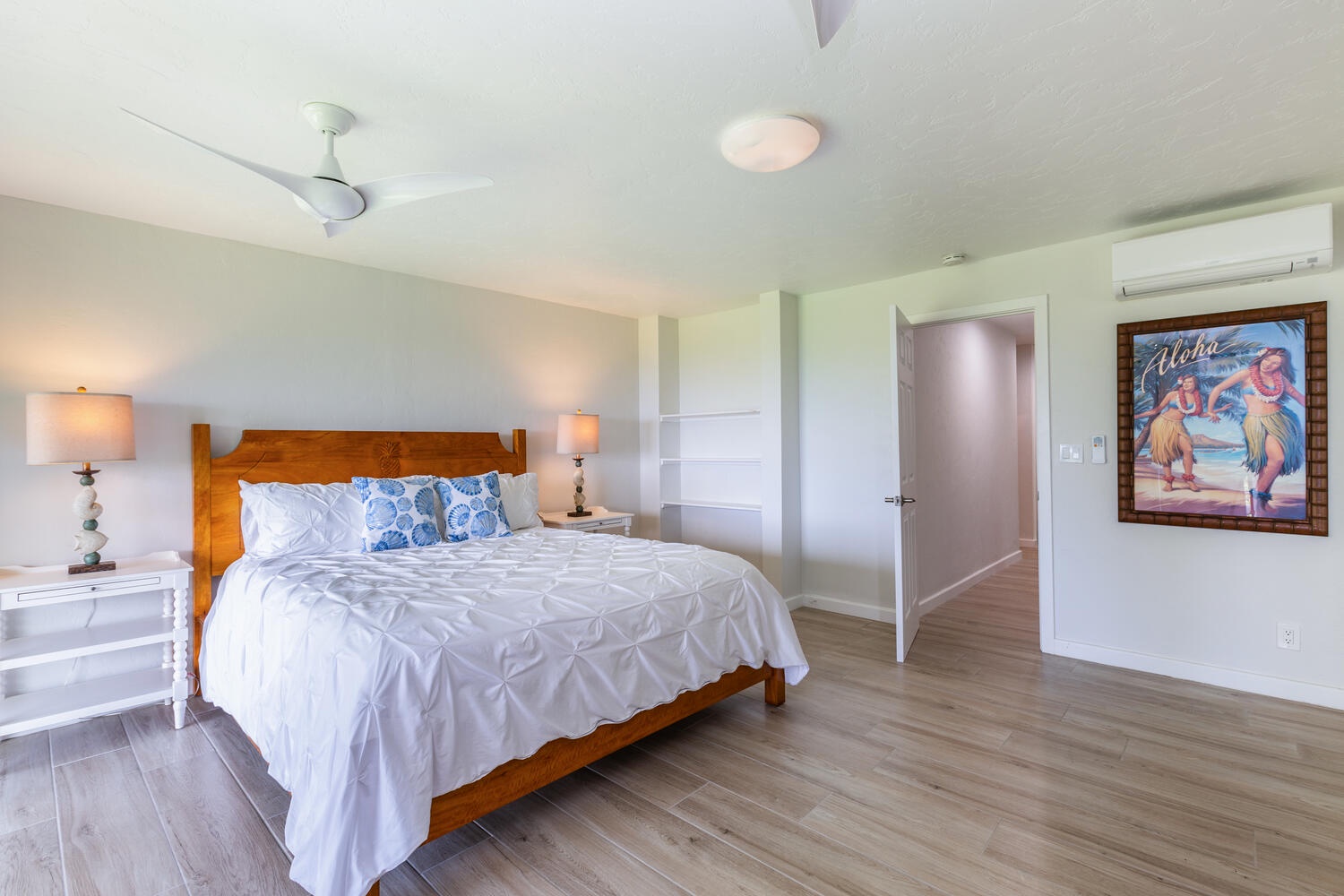 Princeville Vacation Rentals, Wai Lani - Guest Room 2 - Spacious and airy bedroom with a king-sized bed and minimalist decor.