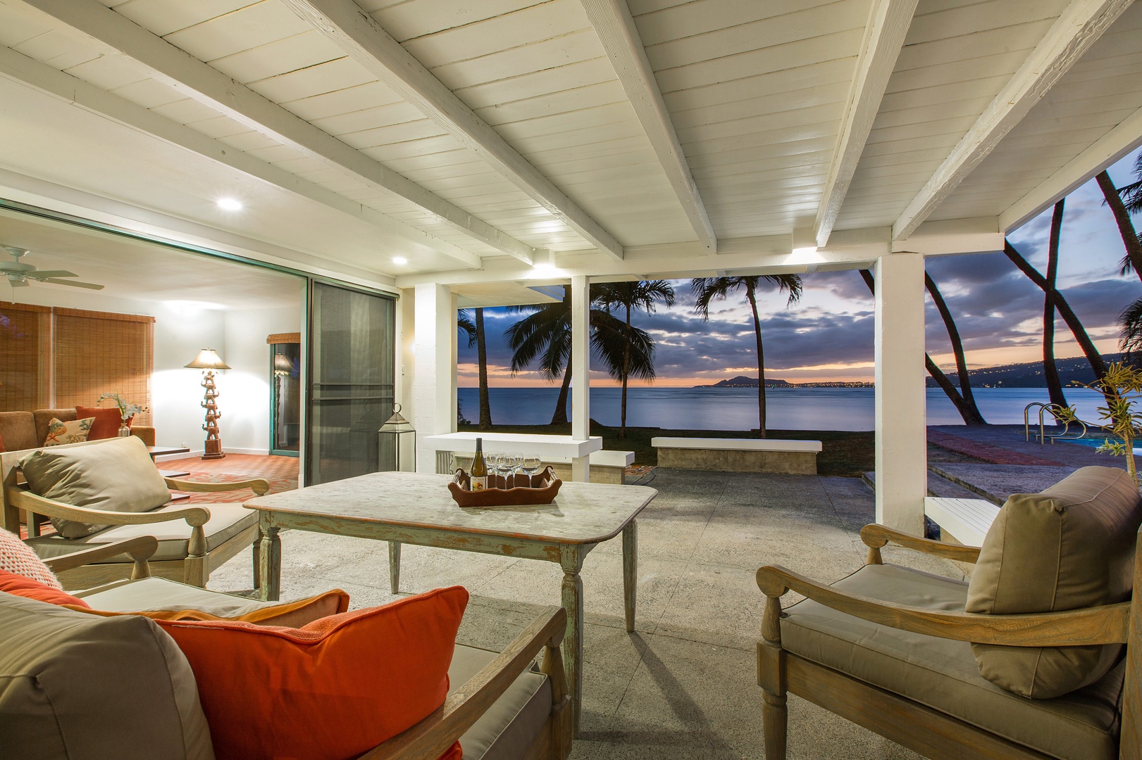 Honolulu Vacation Rentals, Hale Kai - Take in the sunset views from the covered lanai!
