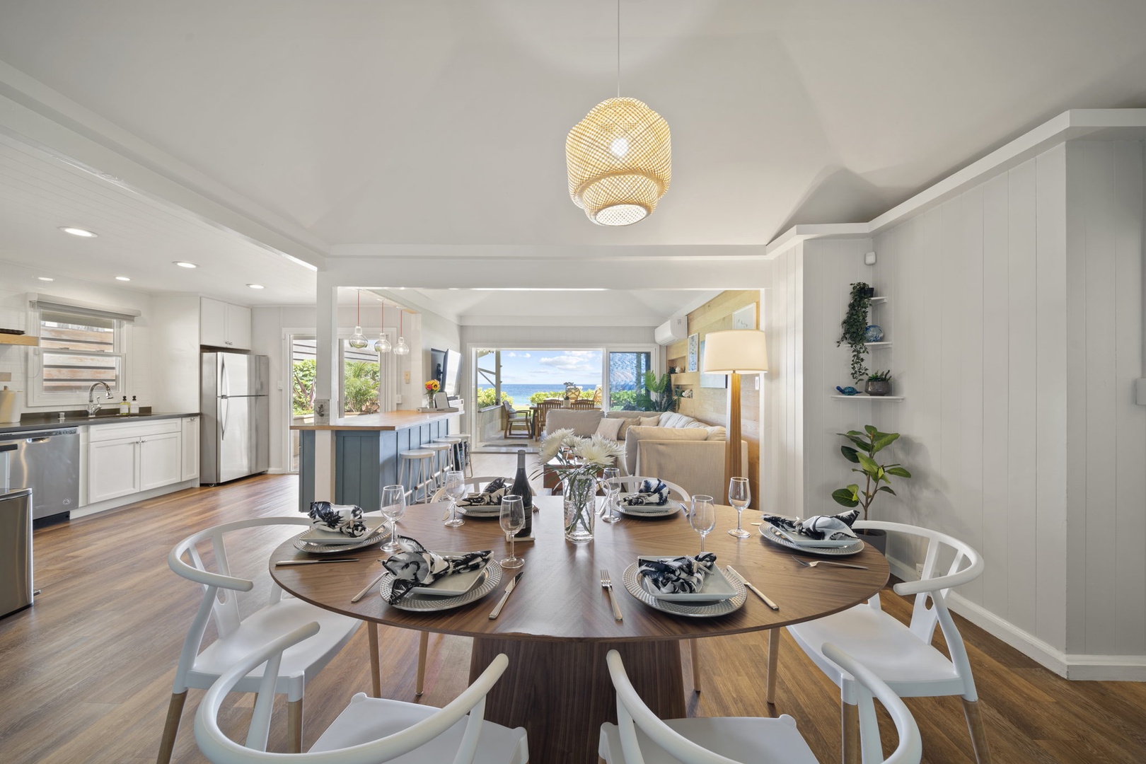 Haleiwa Vacation Rentals, Hale Nalu - Relish meals in our formal dining area, seating six, overlooking serene views of your private lanai downstairs—a feast for eyes and palate.