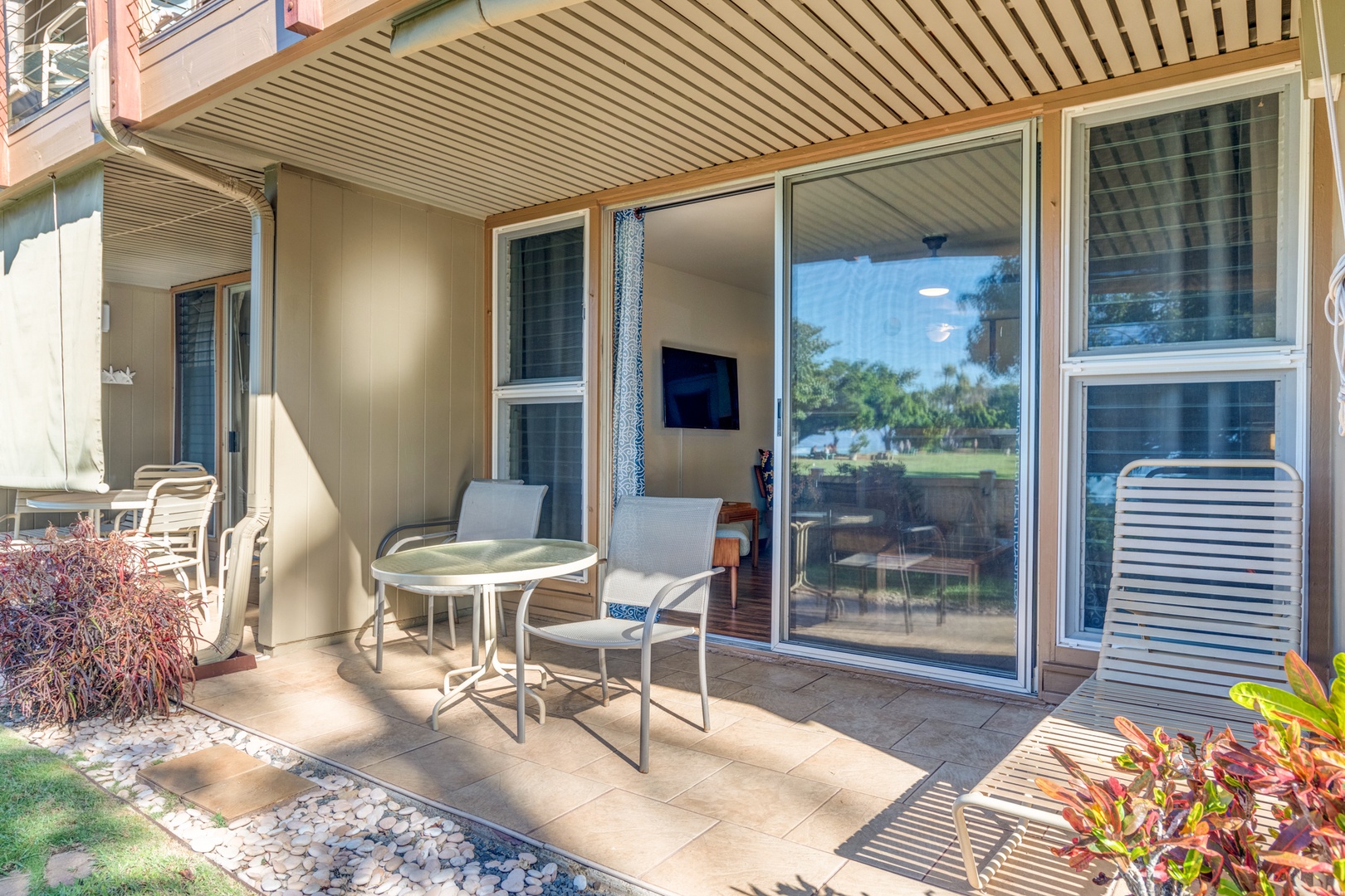 Lahaina Vacation Rentals, Hale Kai 109 - Covered lanai with chaise lounger