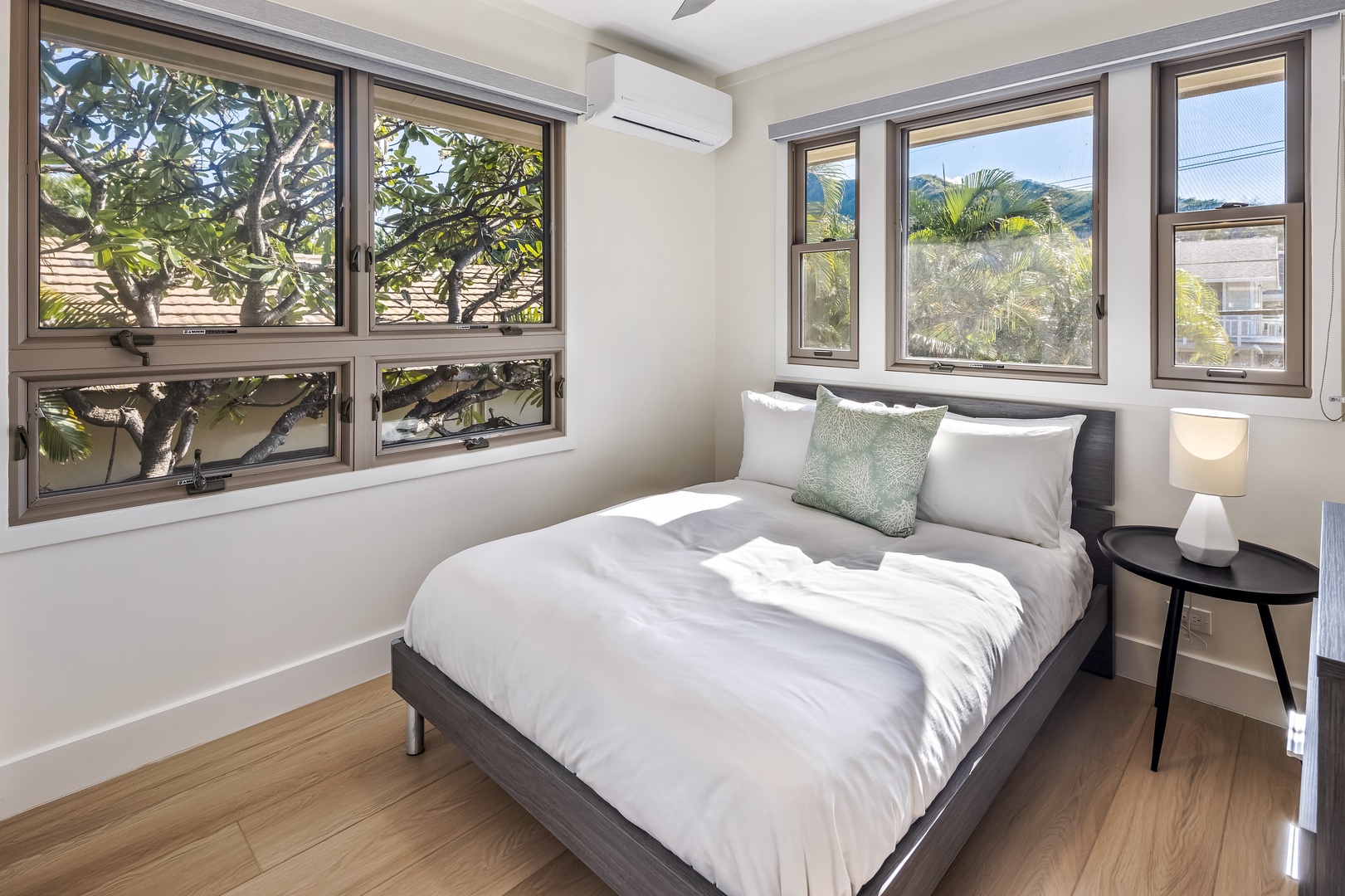 Kailua Vacation Rentals, Na Makana Villa - Guest Bedroom 6 is furnished with a double bed and has mountain views