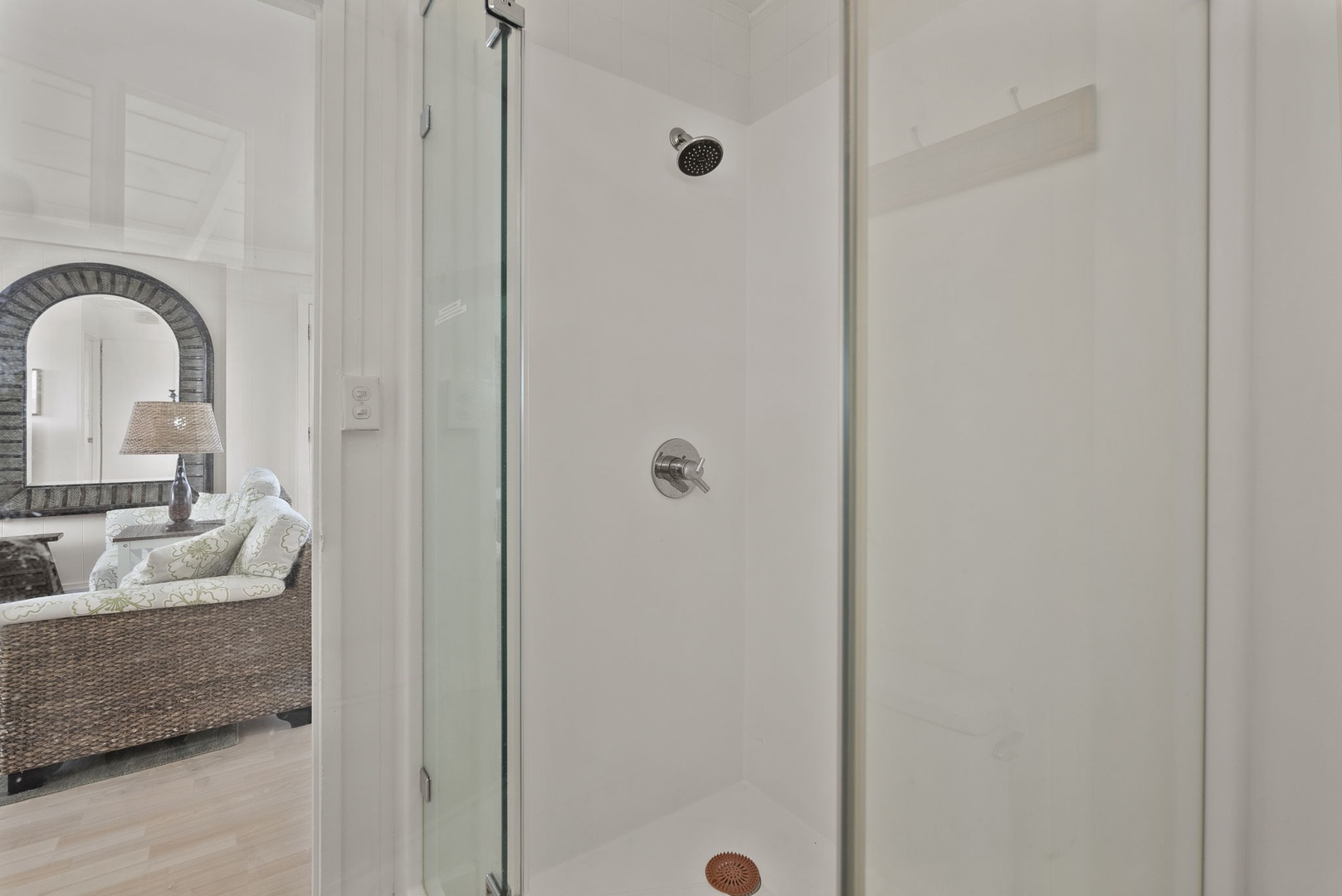 Waianae Vacation Rentals, Ma'ili Blue Estate - Step into your pristine glass-enclosed shower with modern fixtures and refreshing rainfall showerhead for a luxurious cleansing experience.