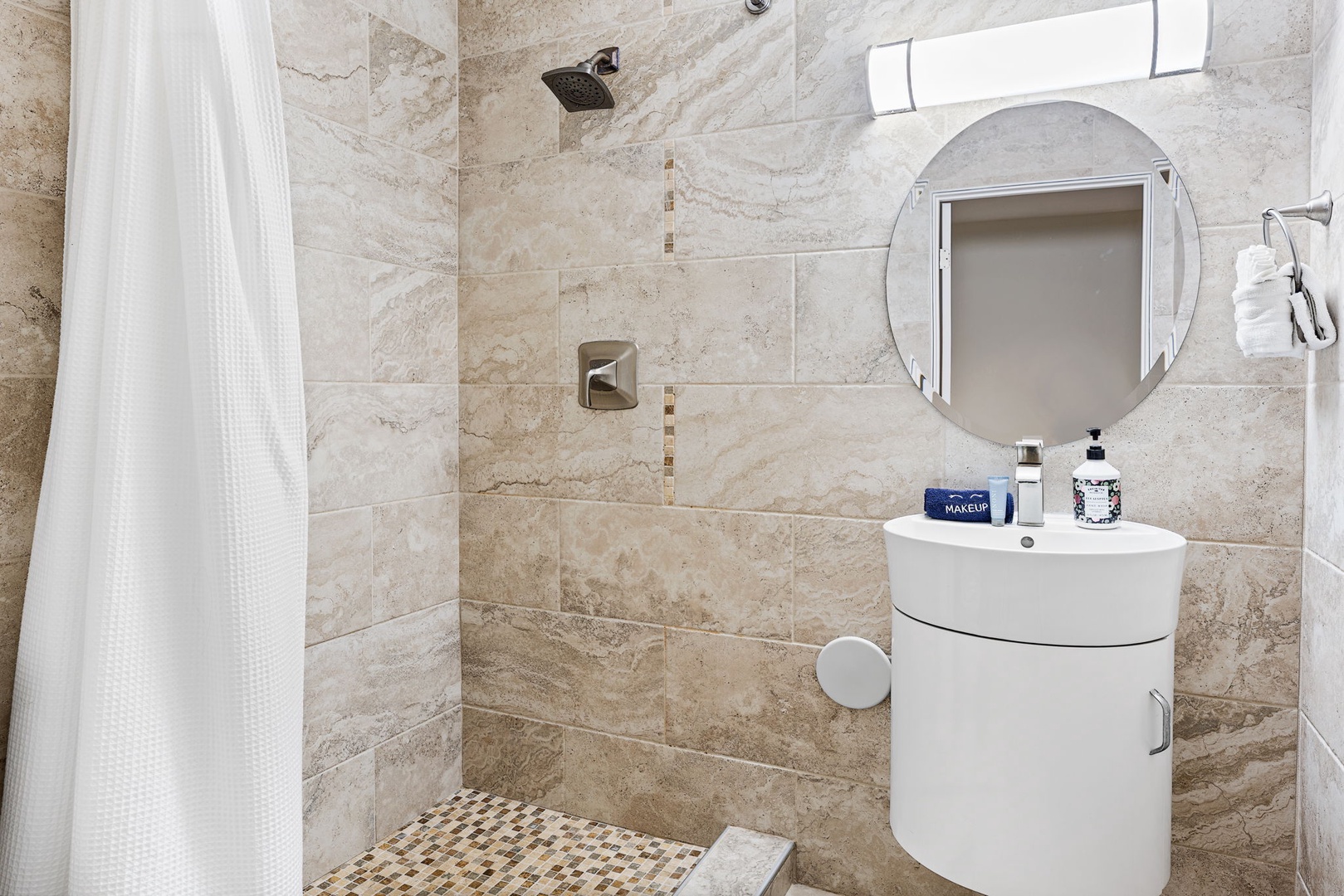 Kailua-Kona Vacation Rentals, Honu Hale - Unwind in your elegant marble bathroom with rainfall shower, modern fixtures, and thoughtful amenities for a luxurious retreat.