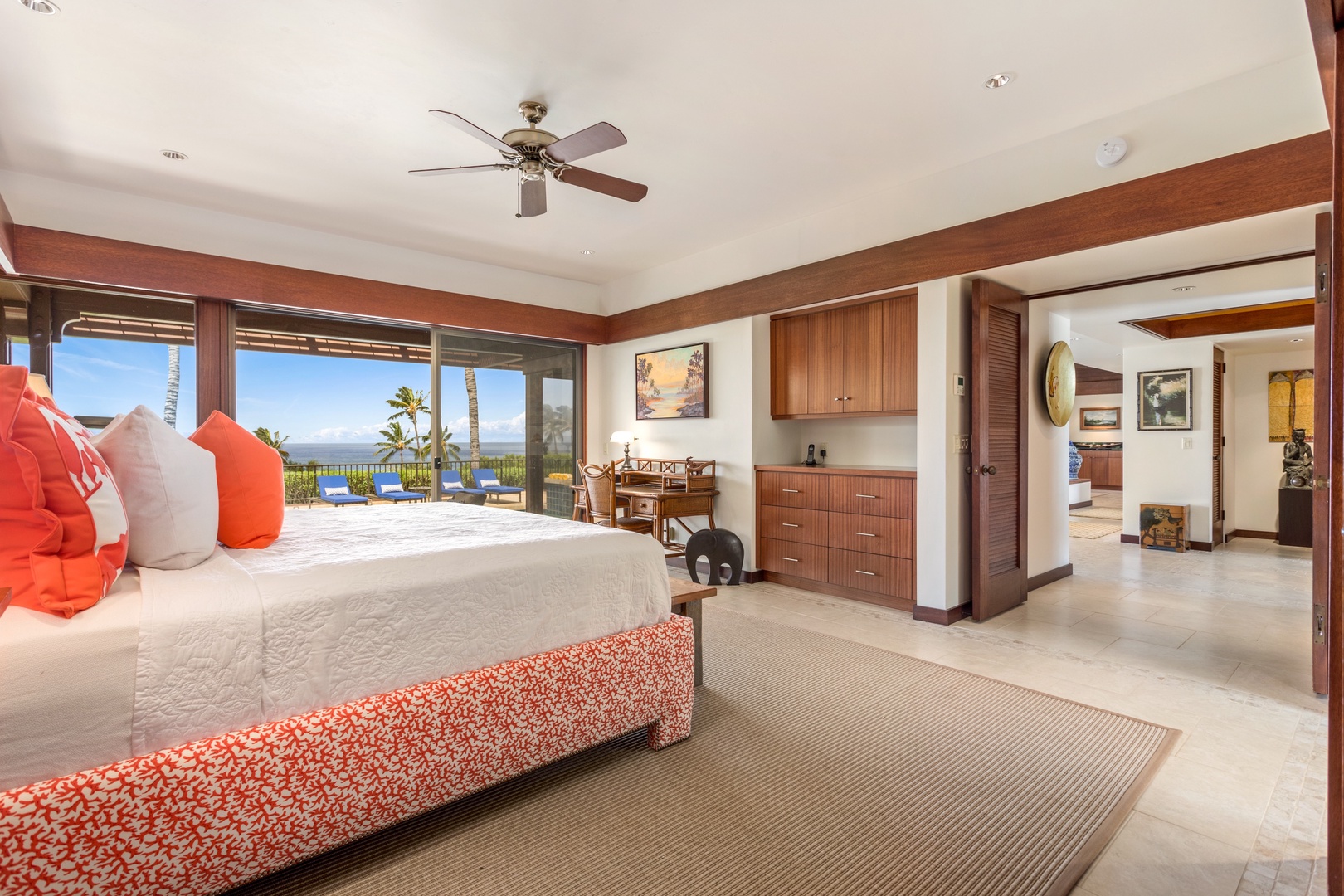 Kamuela Vacation Rentals, 3BD Villas (39) at Mauna Kea Resort - Primary bedroom alternate view, showcasing double entry doors and discreet TV cabinet.
