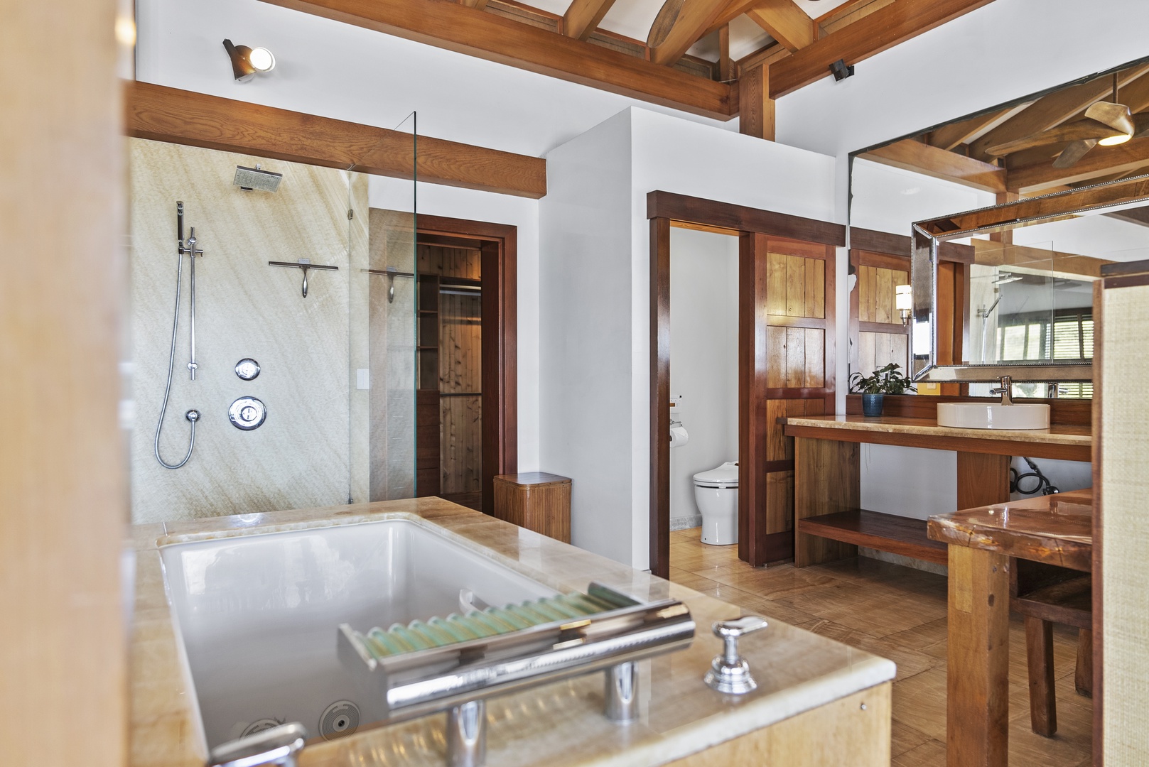 Haleiwa Vacation Rentals, Samurai House - Elegant bathroom featuring a rainfall shower and wooden touches.