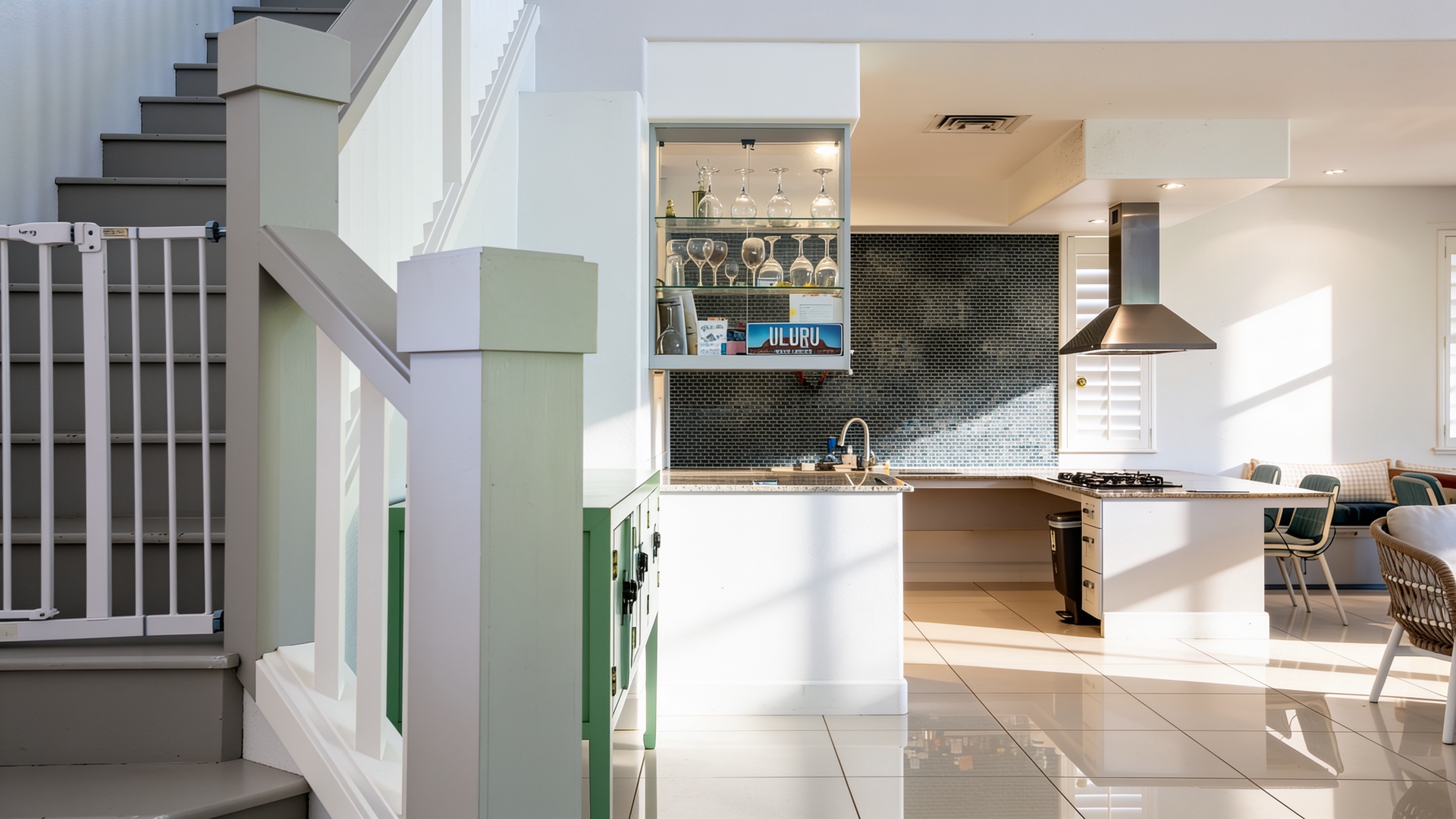 The staircase rises right beside the kitchen, so the last cup of tea goes upstairs with you.