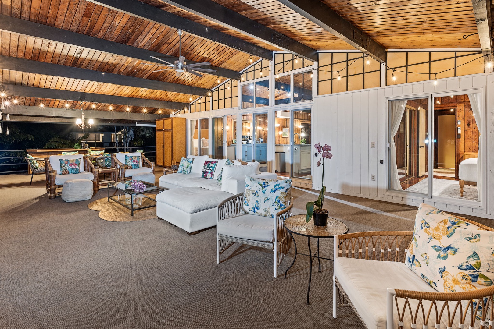 Kailua Kona Vacation Rentals, Mai Tai Manor - Relax in your expansive lanai featuring soaring wood-beam ceilings, elegant furnishings, and seamless indoor-outdoor flow perfect for unwinding.