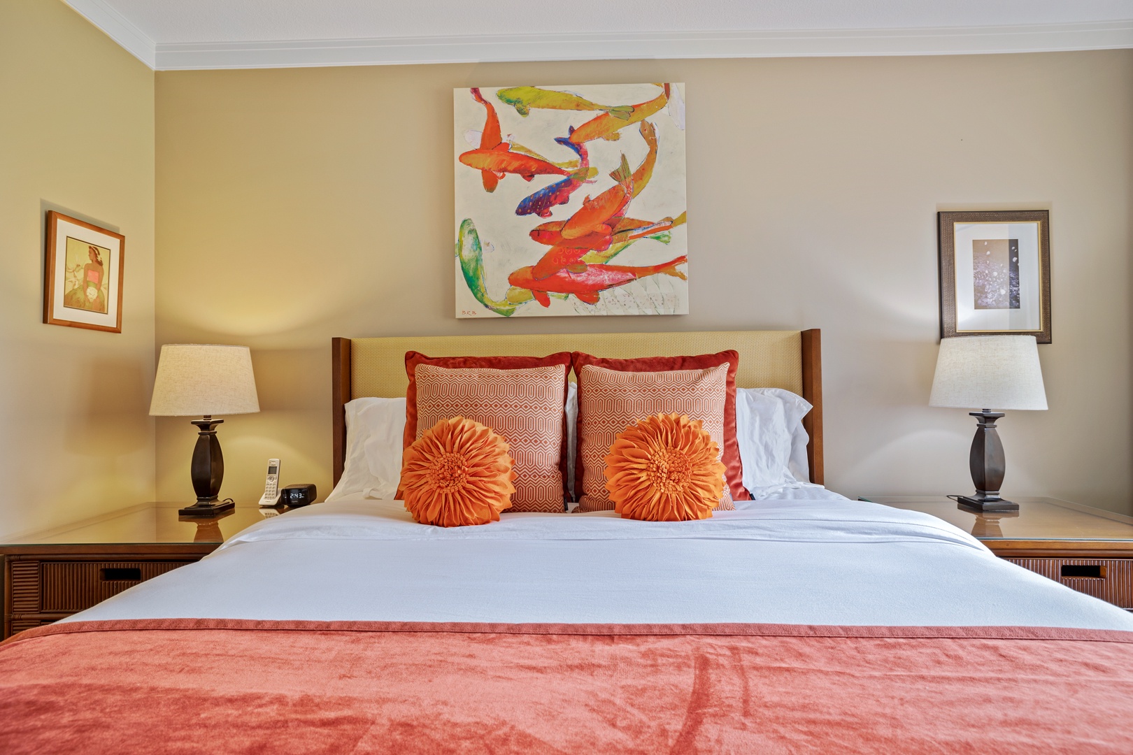 Lahaina Vacation Rentals, Honua Kai Konea 204 - A cozy king-sized bed, which can be converted into twin beds, with vibrant pillows and artwork adds a pop of color, creating a welcoming and restful space.