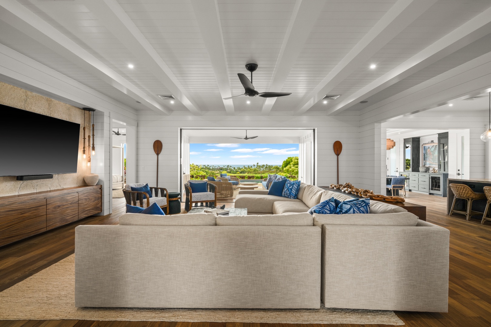 Koloa Vacation Rentals, Makani Kai - The open floor plan keeps the cook, the couch, and the conversation in one place.