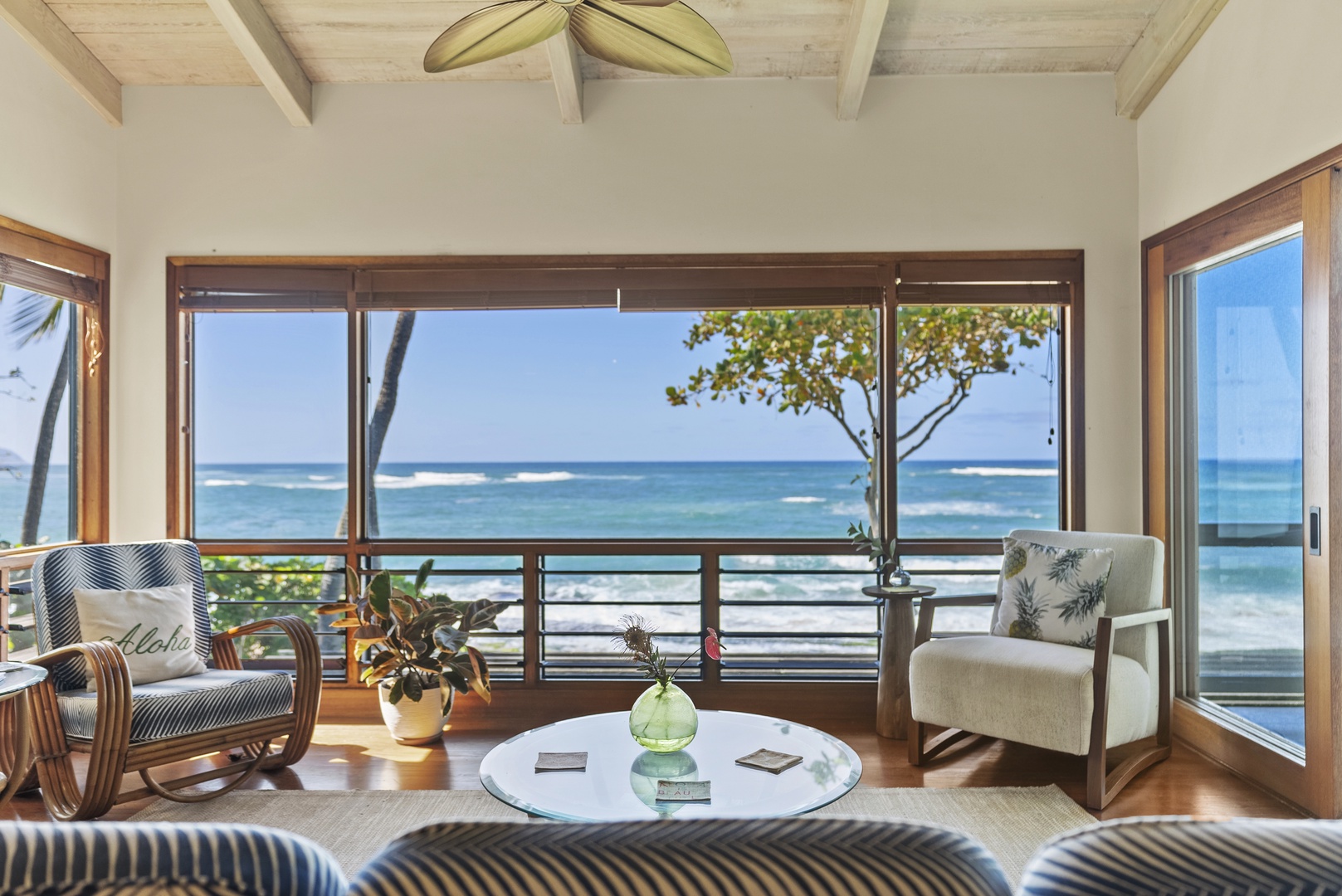 Haleiwa Vacation Rentals, Maluhia Beach House - Unwind in the living room with panoramic ocean views and plenty of natural light.