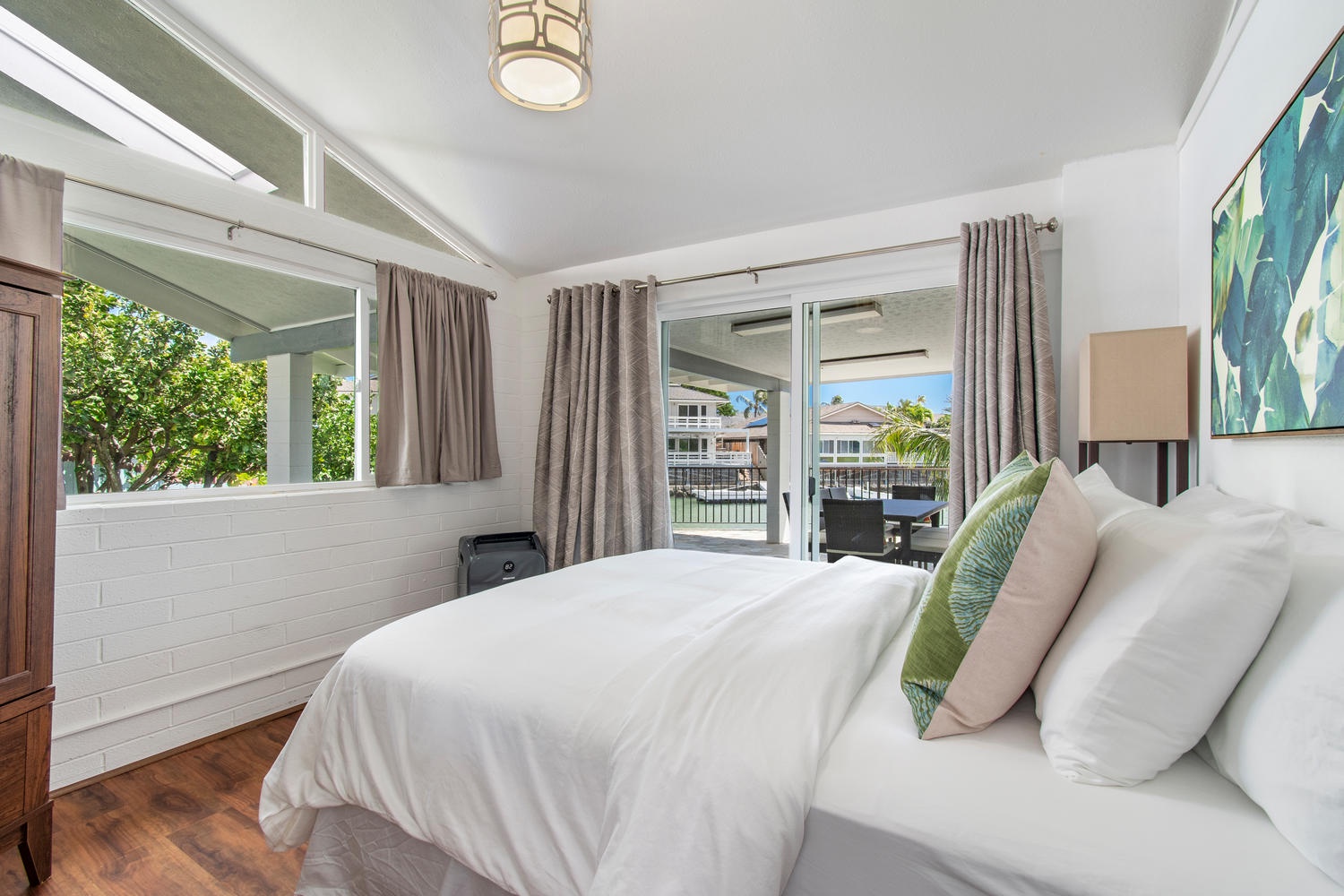 Honolulu Vacation Rentals, Holoholo Hale - Bedroom 4 - Queen bed, standing ac with marina views.
