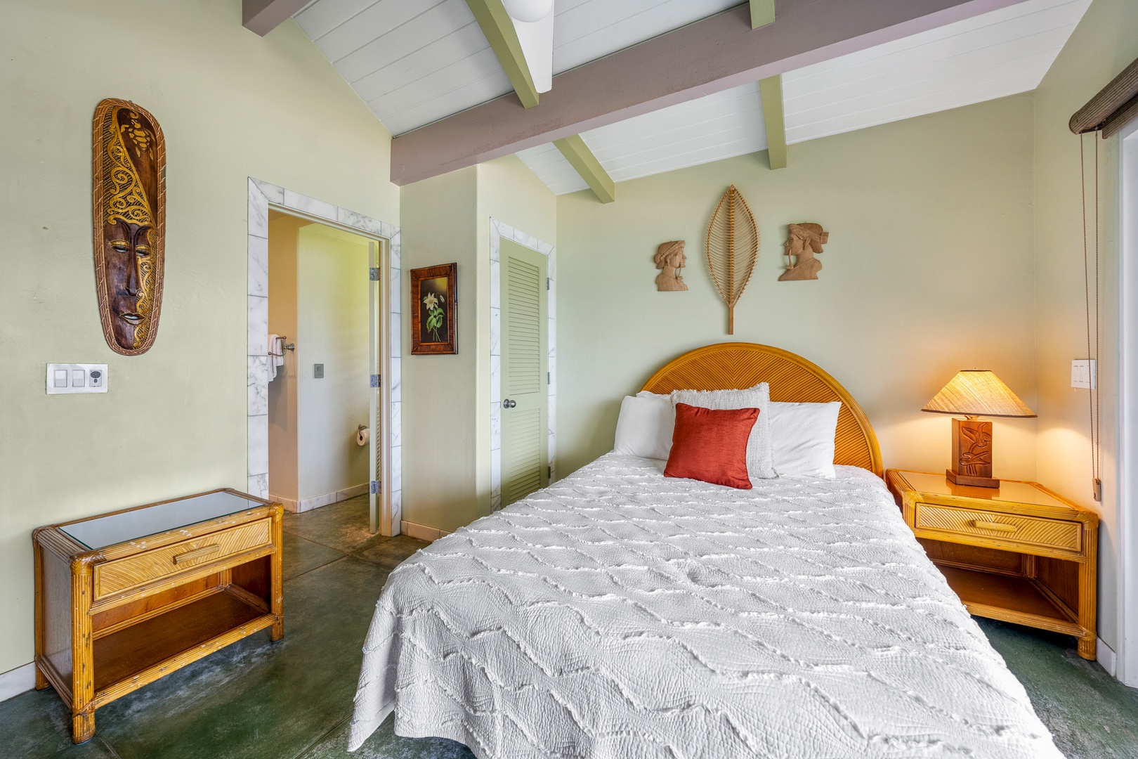 Hanalei Vacation Rentals, Hale Kepuhi - Rest comfortably in this bright bedroom with vaulted ceilings and soft island breezes from the nearby lanai.