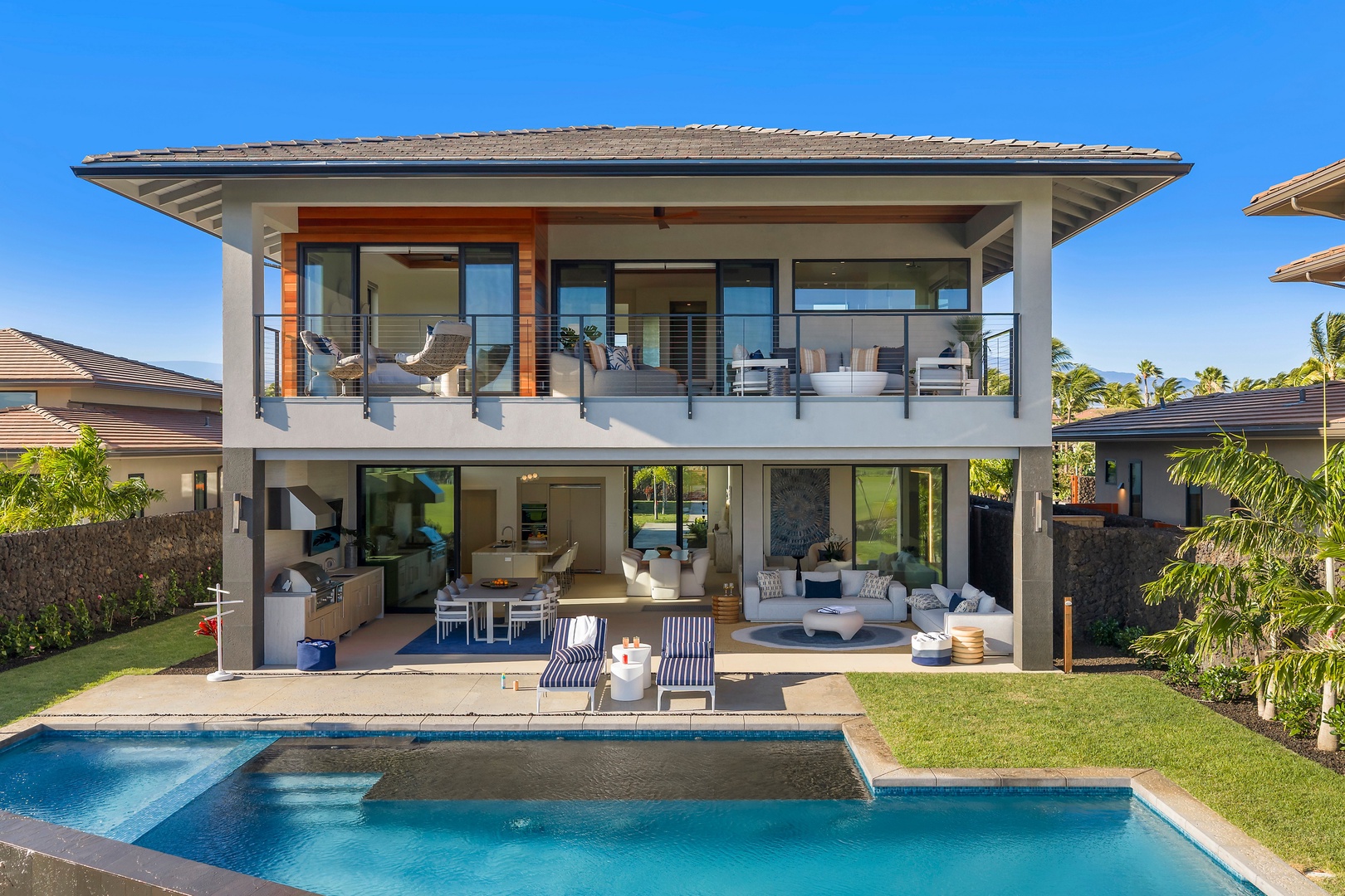 Kamuela Vacation Rentals, 6BD Mauna Lani Lux Golf Estate (6) at One Ocean - Designed for connection and relaxation, the estate centers around an infinity-edge pool framed by tropical landscaping.