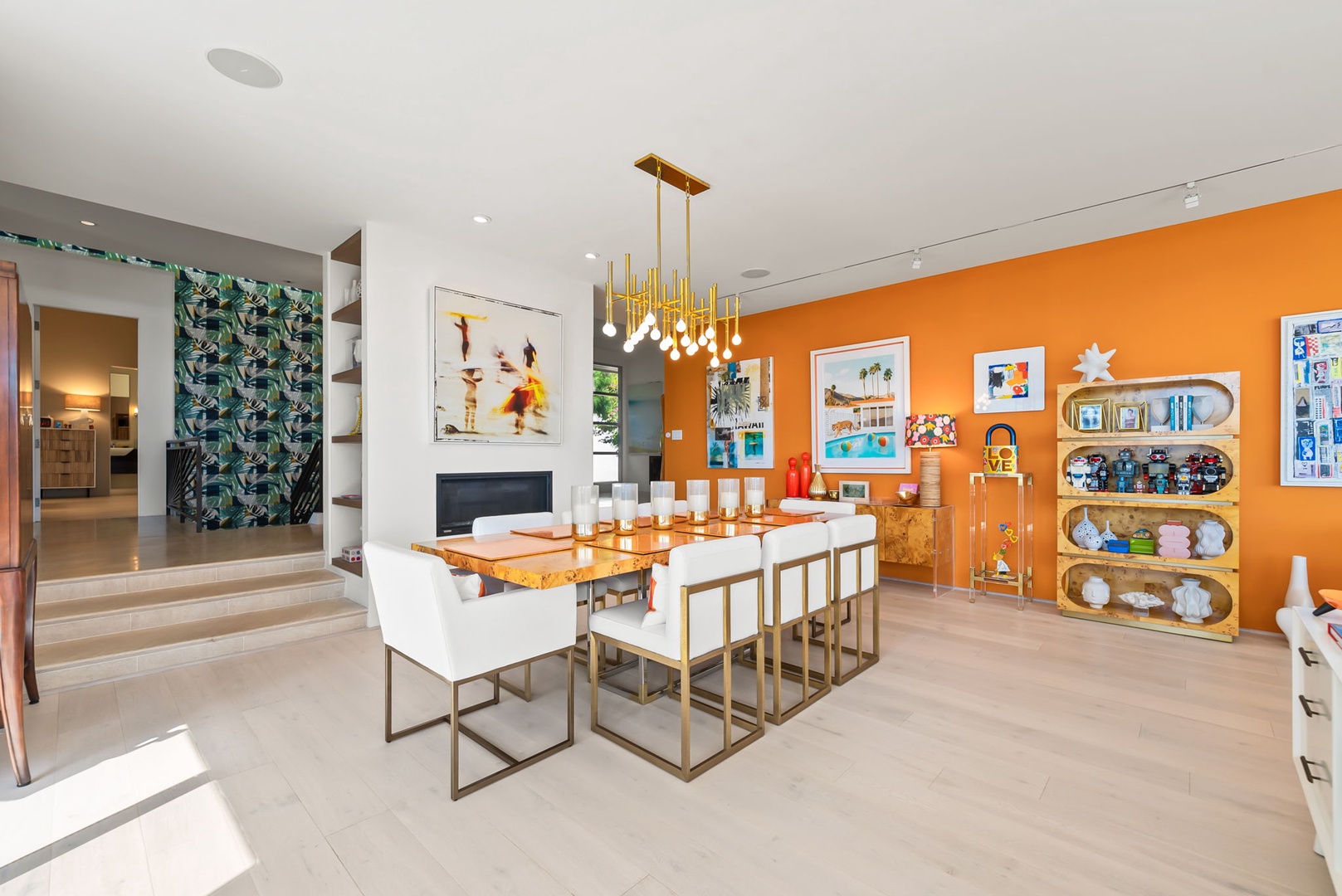 Honolulu Vacation Rentals, Kahala Hills Estate - Contemporary dining space featuring bold art, warm tones, and elegant lighting.