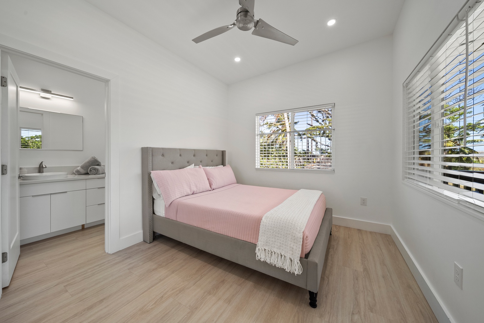 Haleiwa Vacation Rentals, Sunset Beach Island Retreat - This cozy bedroom is designed with comfort in mind, featuring a plush bed with soft linens