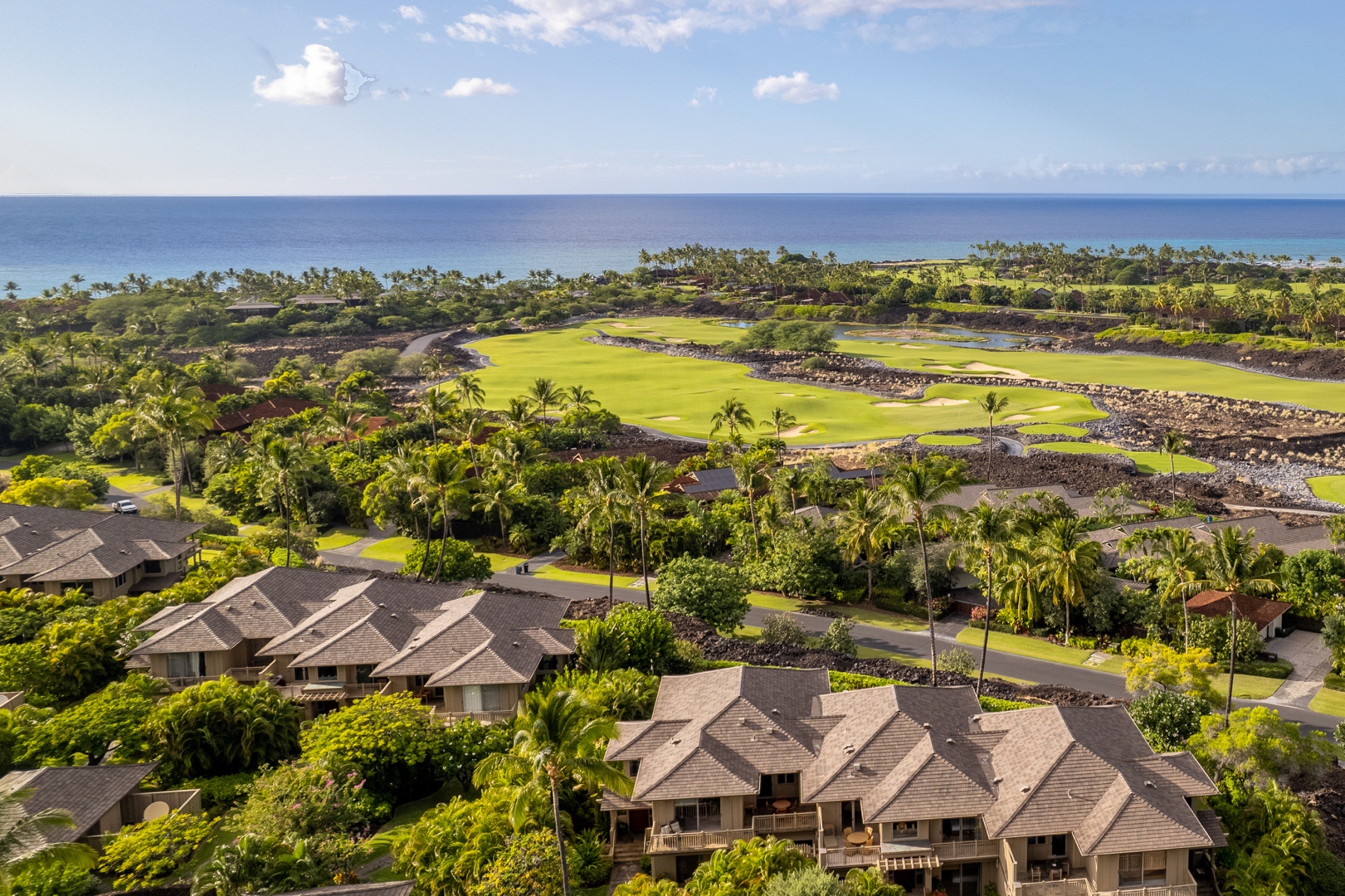 Kailua Kona Vacation Rentals, 3BD Ke Alaula Villa (210B) at Four Seasons Resort at Hualalai - Wide shot of the Ke Alaula Villas with the deep blue Pacific Ocean beyond.