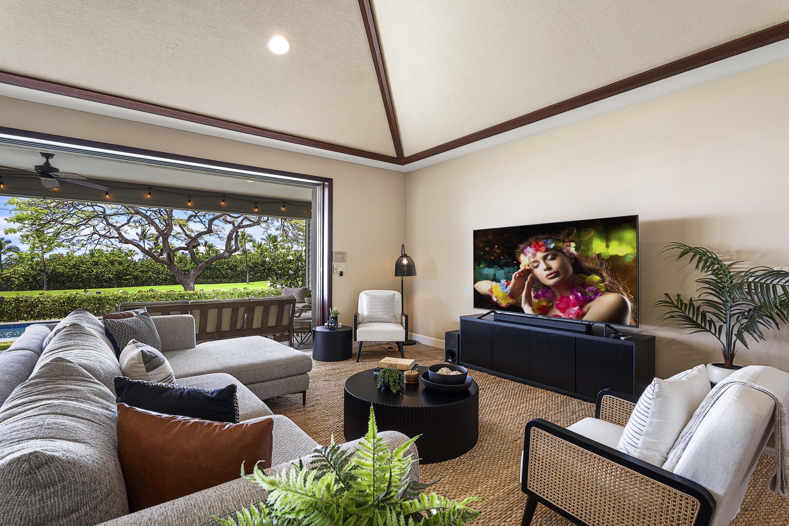 Kailua Kona Vacation Rentals, Holua Kai #27 - Movie night on the sectional, doors open to the evening air.