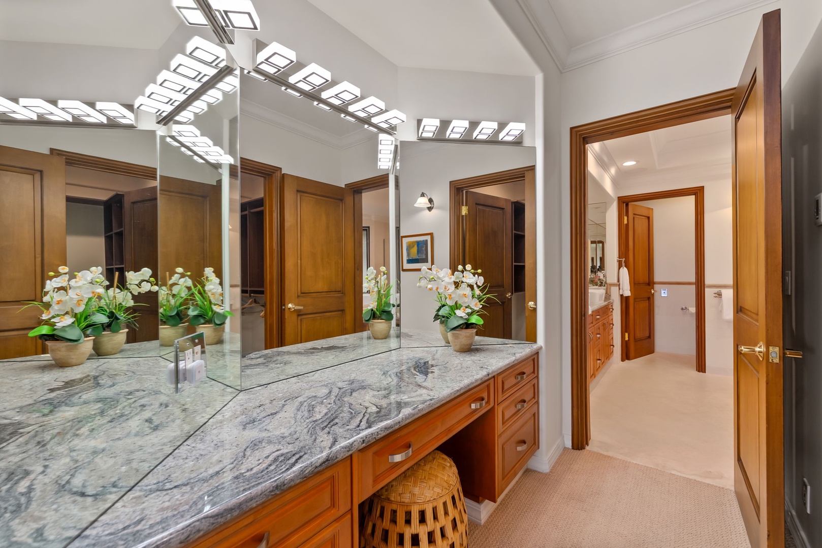 Honolulu Vacation Rentals, Maunalua Estate - Bright skylights, marble finishes, and warm wood details create a polished space to refresh and unwind.