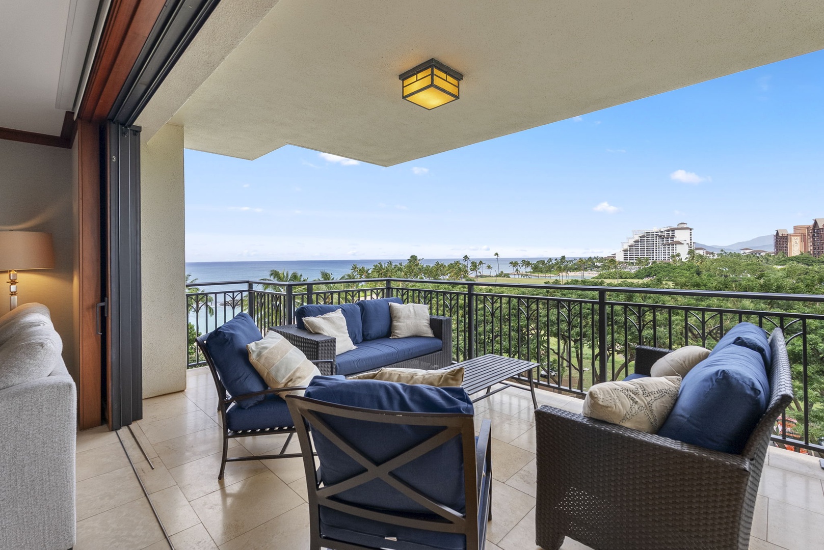 Kapolei Vacation Rentals, Ko Olina Beach Villas B604 - Step onto your private balcony and sink into plush seating while taking in stunning ocean views stretching to the horizon.