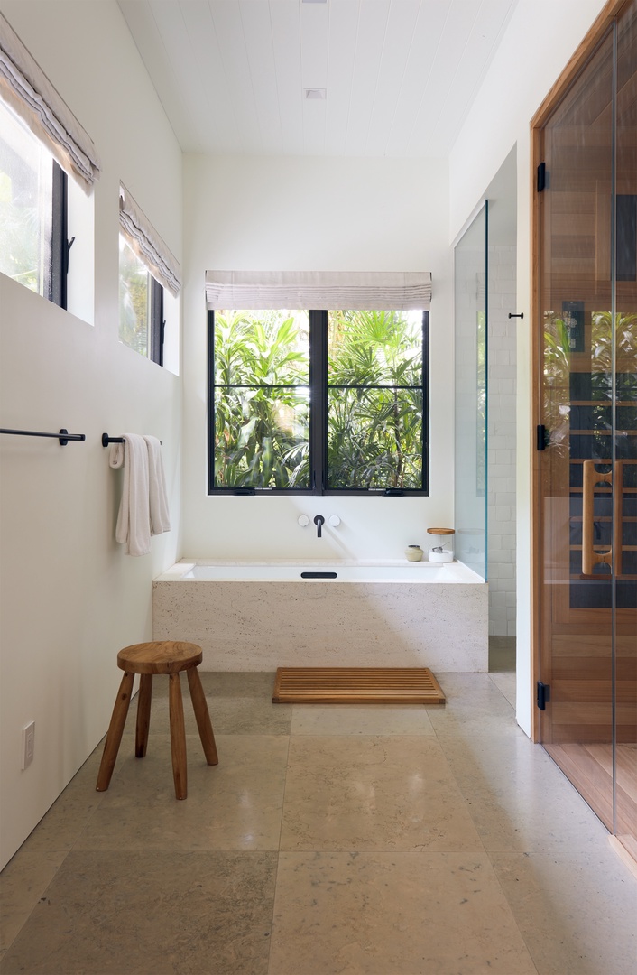 Honolulu Vacation Rentals, Diamond Head Hillside Estate** - Begin your day with garden views and natural light in this spacious primary bathroom, thoughtfully designed with a soaking tub and a calming, spa-inspired atmosphere.