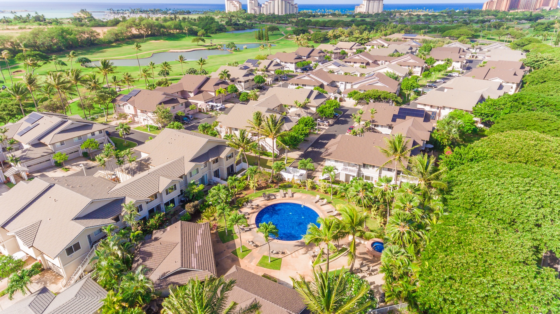 Kapolei Vacation Rentals, Fairways at Ko Olina 33F - Go for a swim in the sparkling waters and rest in the lounge chairs at the community pool.