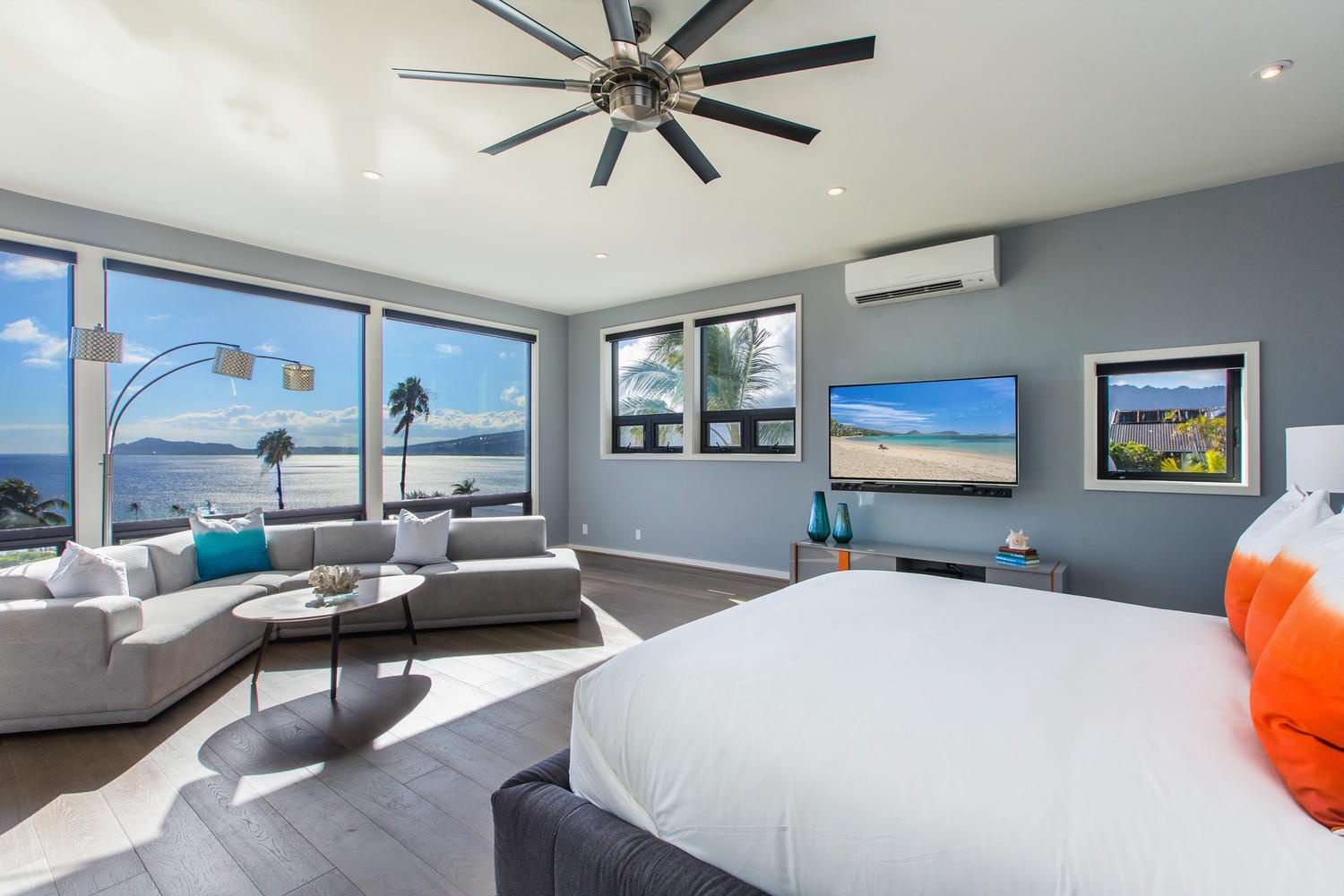 Honolulu Vacation Rentals, Aloha Nalu - Extra large primary with walk-in closet, two sitting areas, desk for catching up on a few emails, and large smart TV!