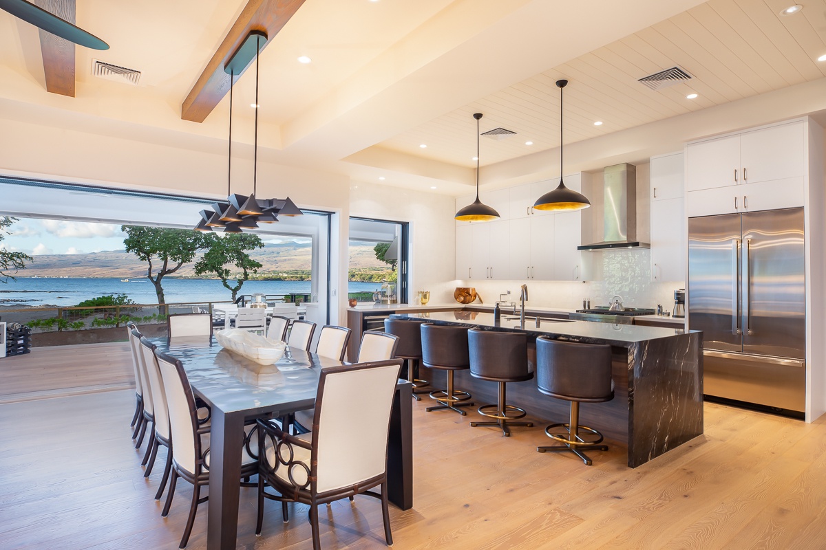 Kamuela Vacation Rentals, Puako Beach Getaway - The open-concept floorplan effortlessly marries the living, dining, and kitchen spaces, fostering a harmonious living experience.