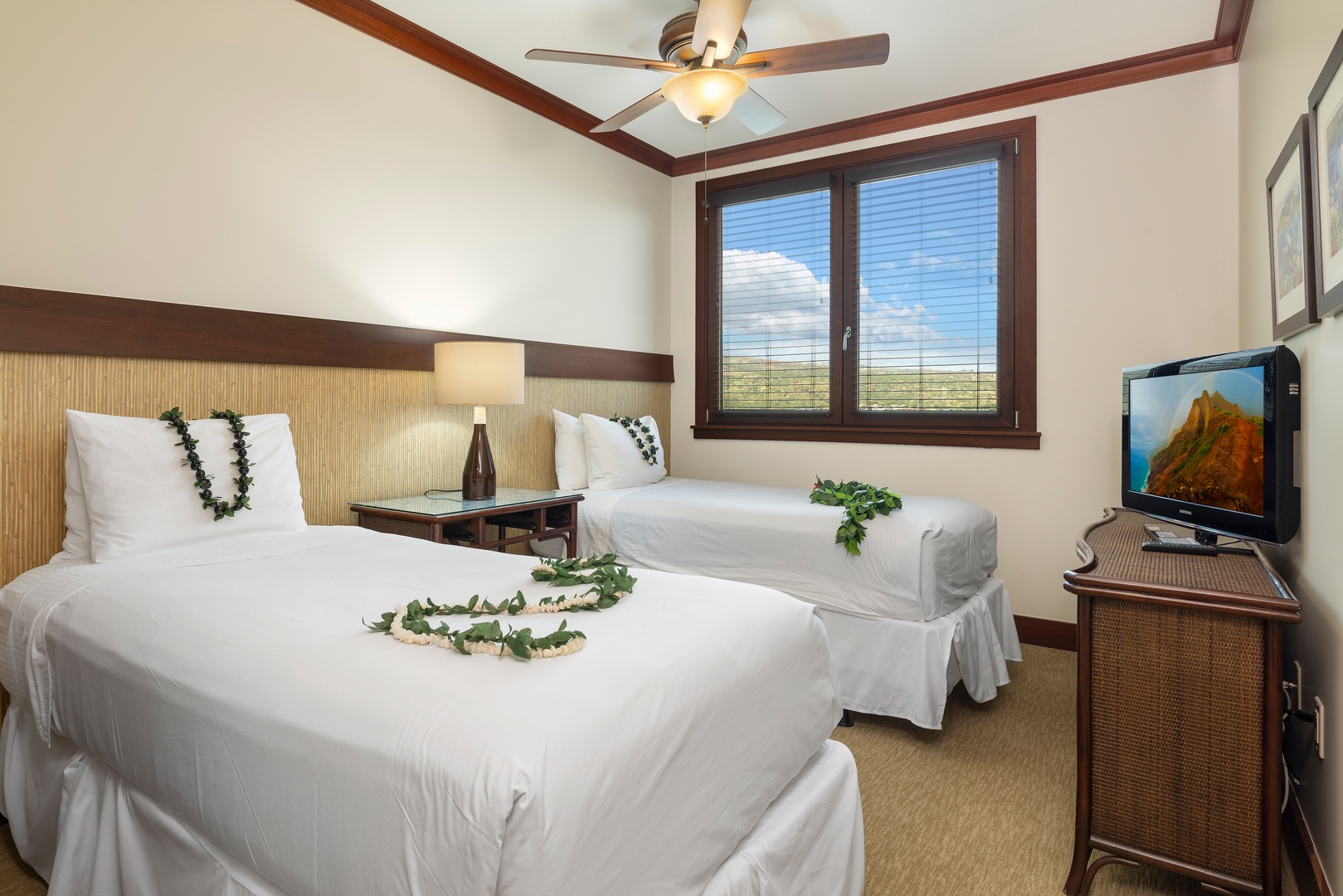 Kapolei Vacation Rentals, Ko Olina Beach Villas O1402 - The third guest bedroom has twin beds with scenic views and tropical decor.