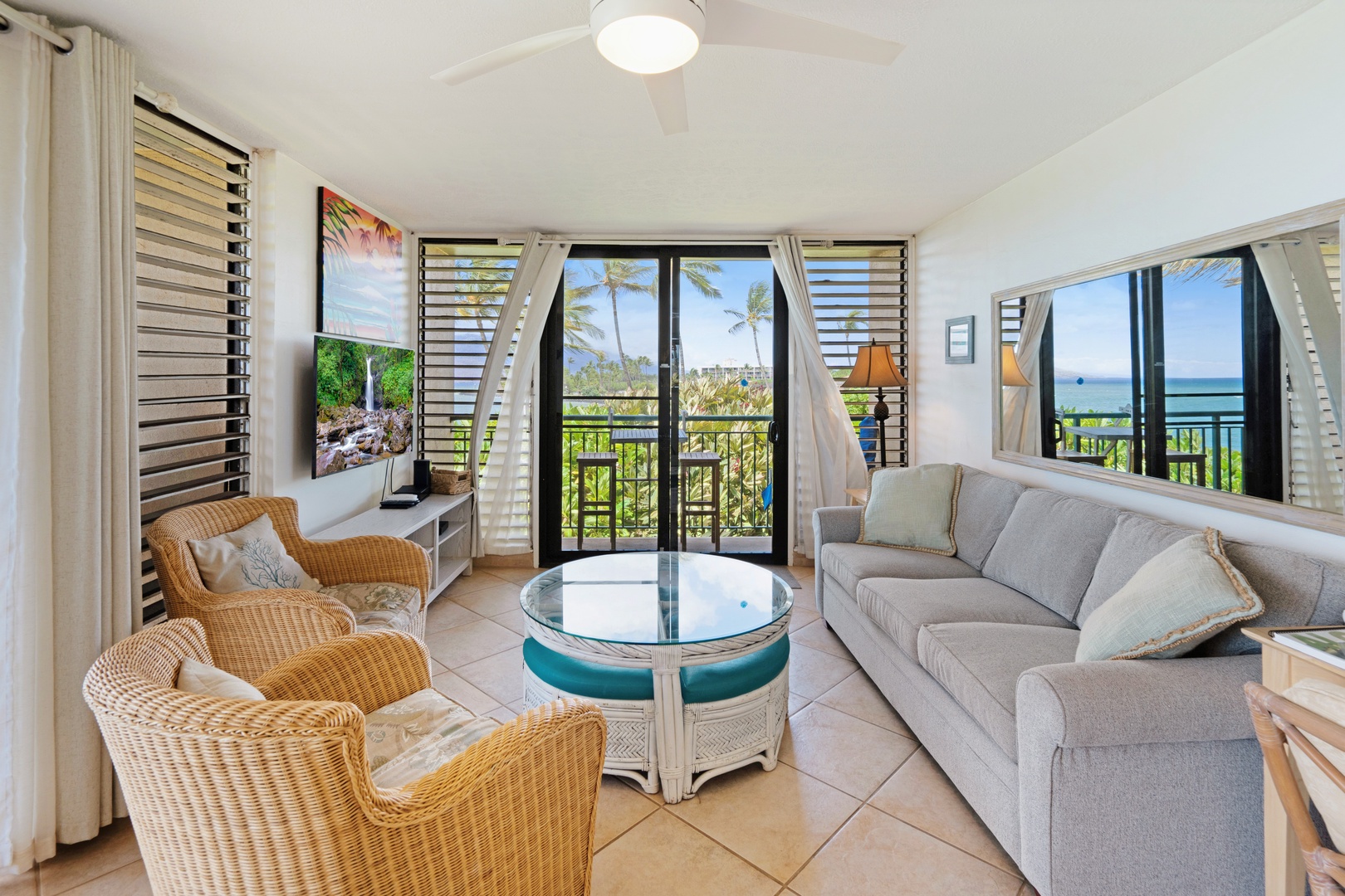 Kihei Vacation Rentals, Punahoa Beach 205 - Slide open the doors and the living room spills straight onto a lanai facing the water.