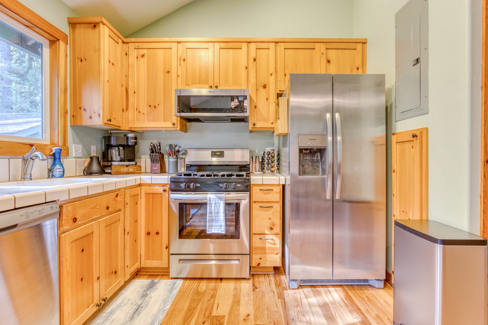 Brightwood Vacation Rentals, Riverside Retreat - The kitchen is fully equipped with stainless steel appliances