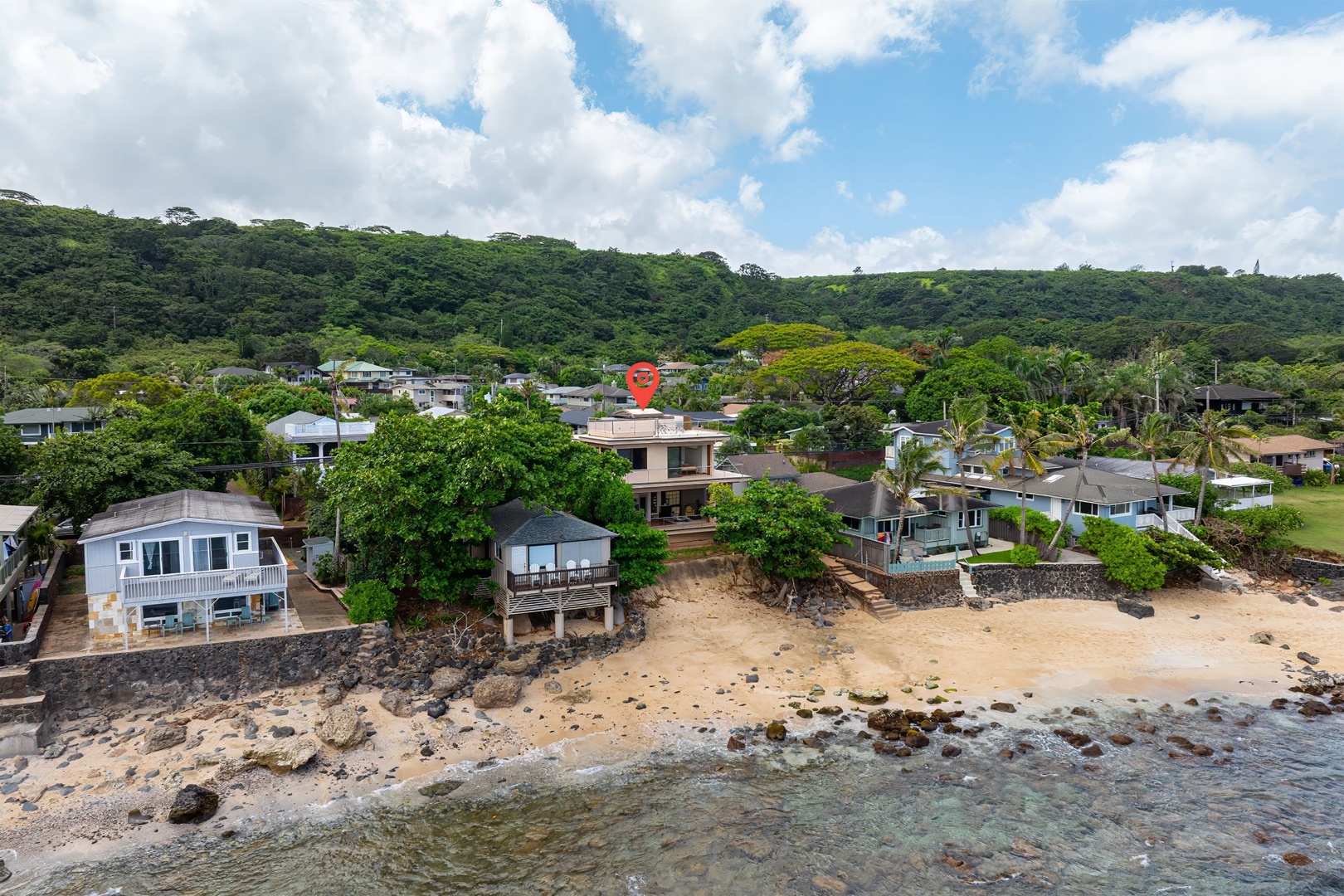 Haleiwa Vacation Rentals, HaleGator - Aerial view showcasing HaleGator’s exceptional oceanfront location along a quiet stretch of Oahu’s North Shore.