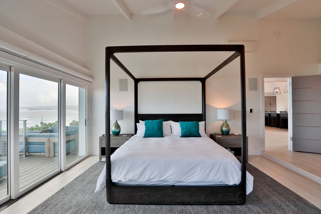 Waialua Vacation Rentals, Sea of Glass* - 2nd Primary Bedroom with ocean views and lanai access