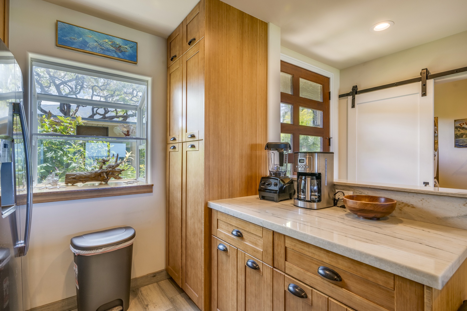 Lahaina Vacation Rentals, Puamana 240-3 - Start your day with island sunshine streaming through the kitchen windows—fully equipped for morning coffee and quick bites.