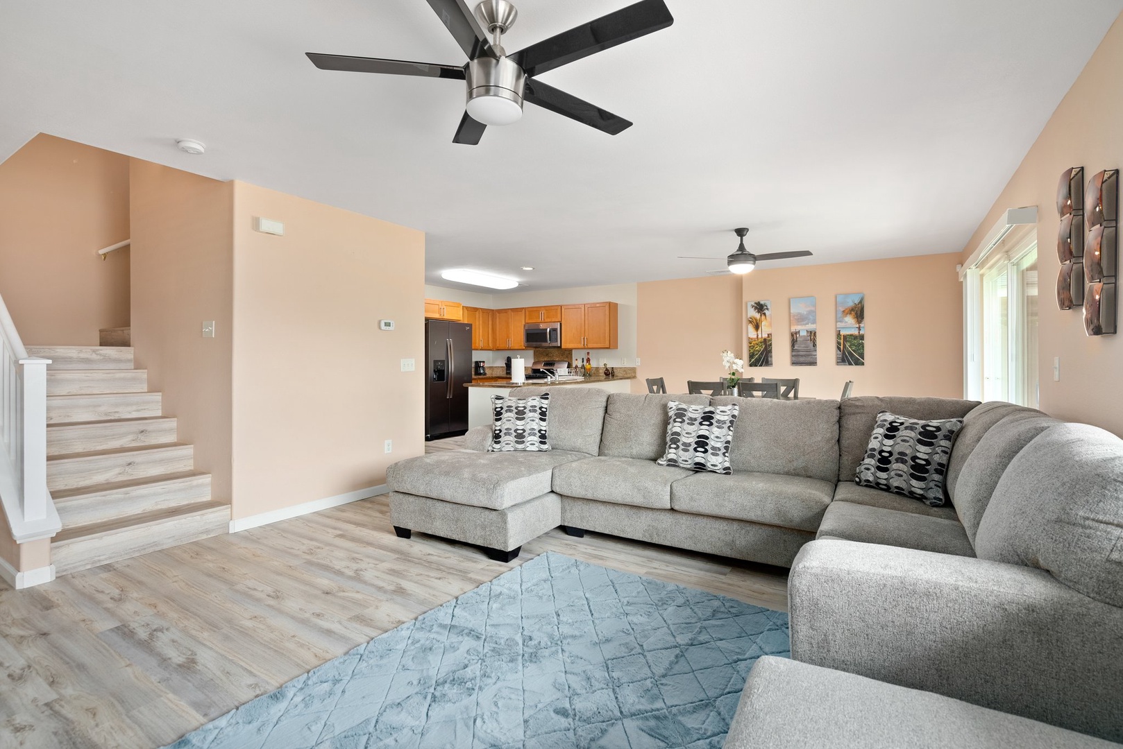 Kapolei Vacation Rentals, Kilipue Retreat - Open-concept living space with central A/C and ceiling fans for year-round comfort.