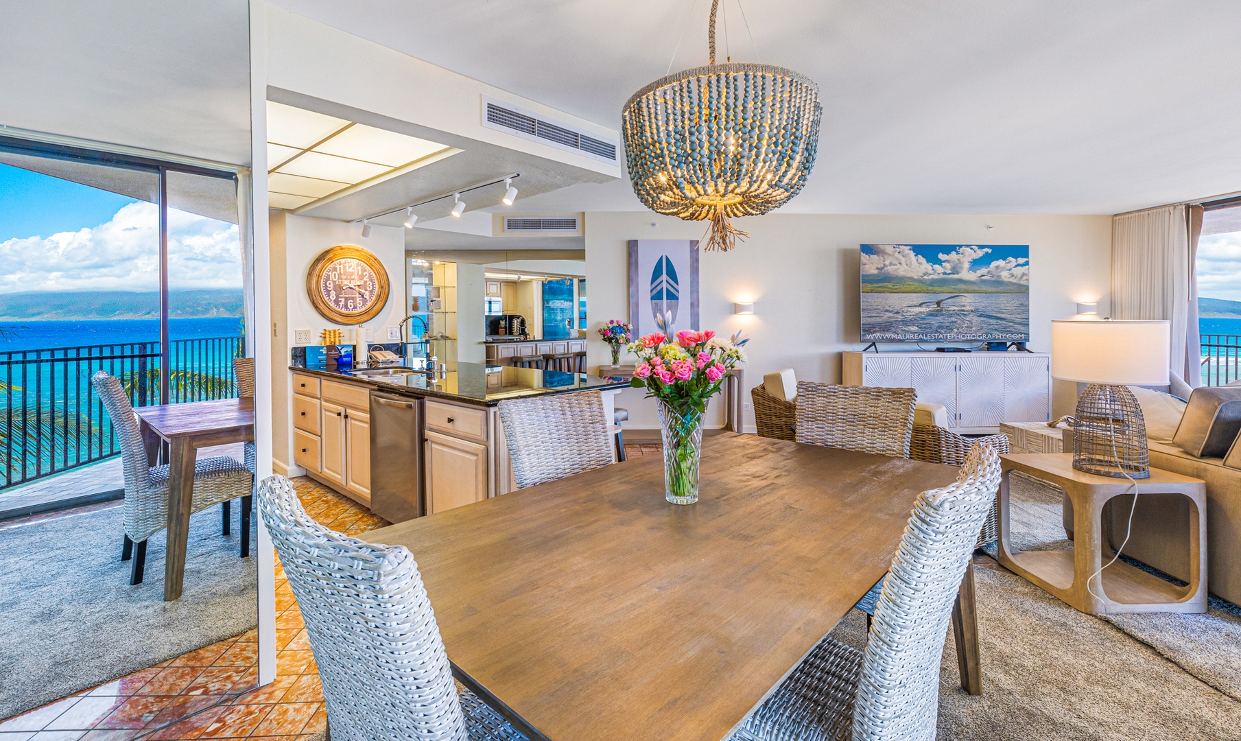 Lahaina Vacation Rentals, Kaanapali Shores 502 - The elegant dining area, with its charming chandelier and spacious table, creates an ideal setting for enjoying meals together.