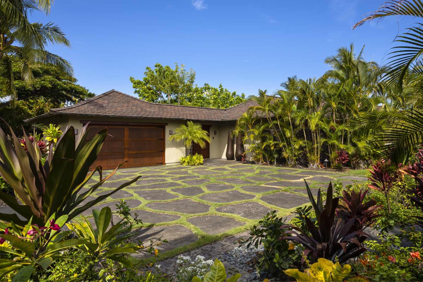 Kailua Kona Vacation Rentals, 4BD Kahikole Street (218) Estate Home at Four Seasons Resort at Hualalai - Driveway surrounded by luscious landscaping, offering privacy & ample parking