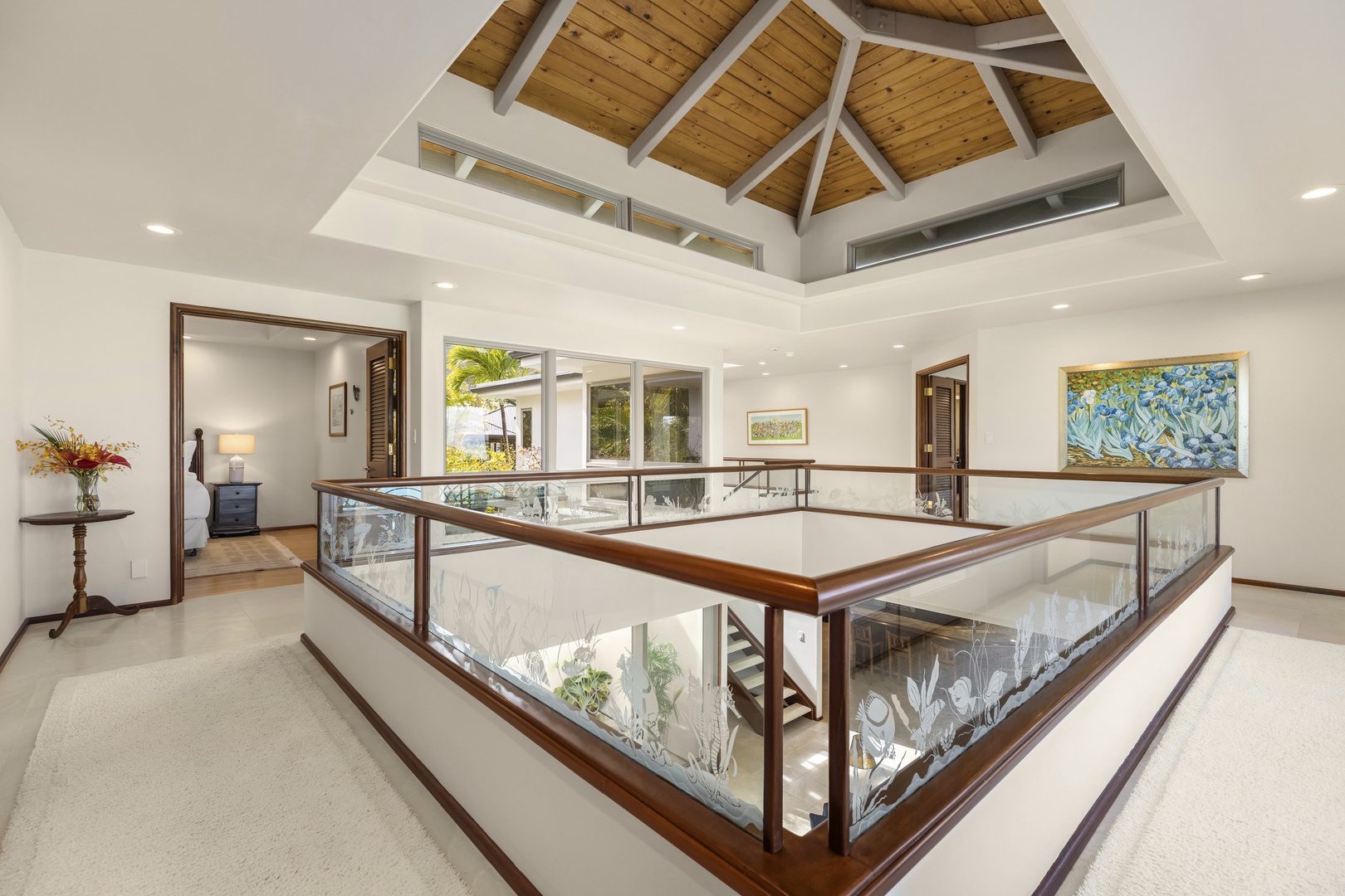 Kailua Vacation Rentals, Mokulua Sunrise - Venture upstairs to the open landing, complete with overhead views of the main living area and amazing views of the beach through the sliding glass doors