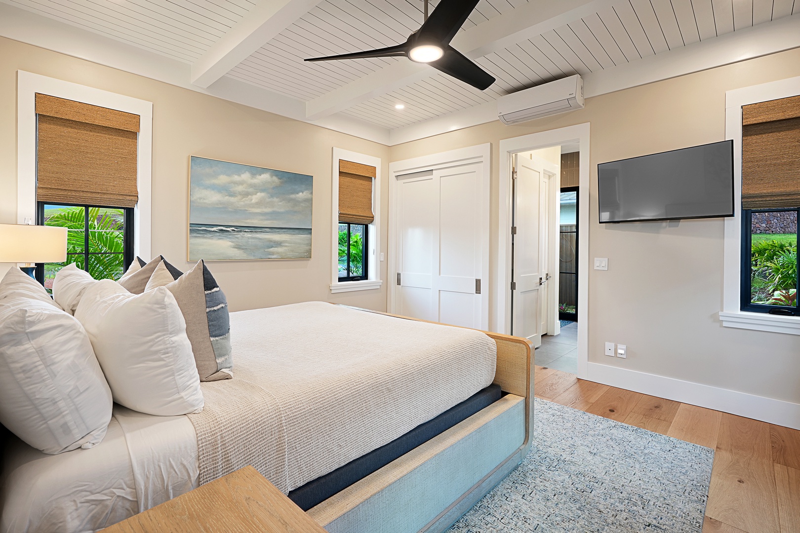 Koloa Vacation Rentals, Hali'a Mai - Crisp linens and a ceiling fan turning slow above the third bedroom's king.